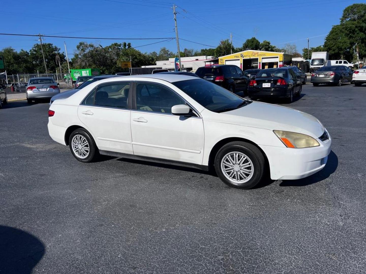 2005 WHITE HONDA ACCORD LX (1HGCM56405A) with an 2.4L engine, Automatic transmission, located at 2929 9th St. West, Bradenton, 34205, (941) 242-2810, 27.473591, -82.570679 - Photo#0