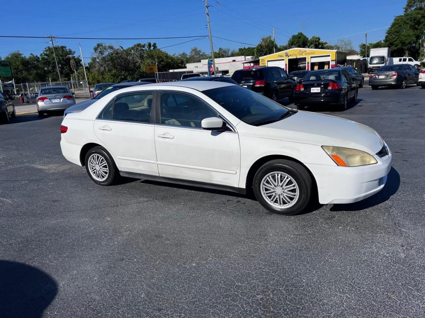 2005 WHITE HONDA ACCORD LX (1HGCM56405A) with an 2.4L engine, Automatic transmission, located at 2929 9th St. West, Bradenton, 34205, (941) 242-2810, 27.473591, -82.570679 - Photo#1