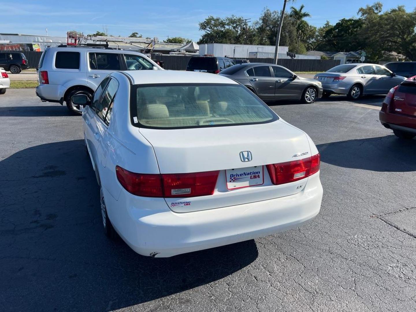 2005 WHITE HONDA ACCORD LX (1HGCM56405A) with an 2.4L engine, Automatic transmission, located at 2929 9th St. West, Bradenton, 34205, (941) 242-2810, 27.473591, -82.570679 - Photo#4