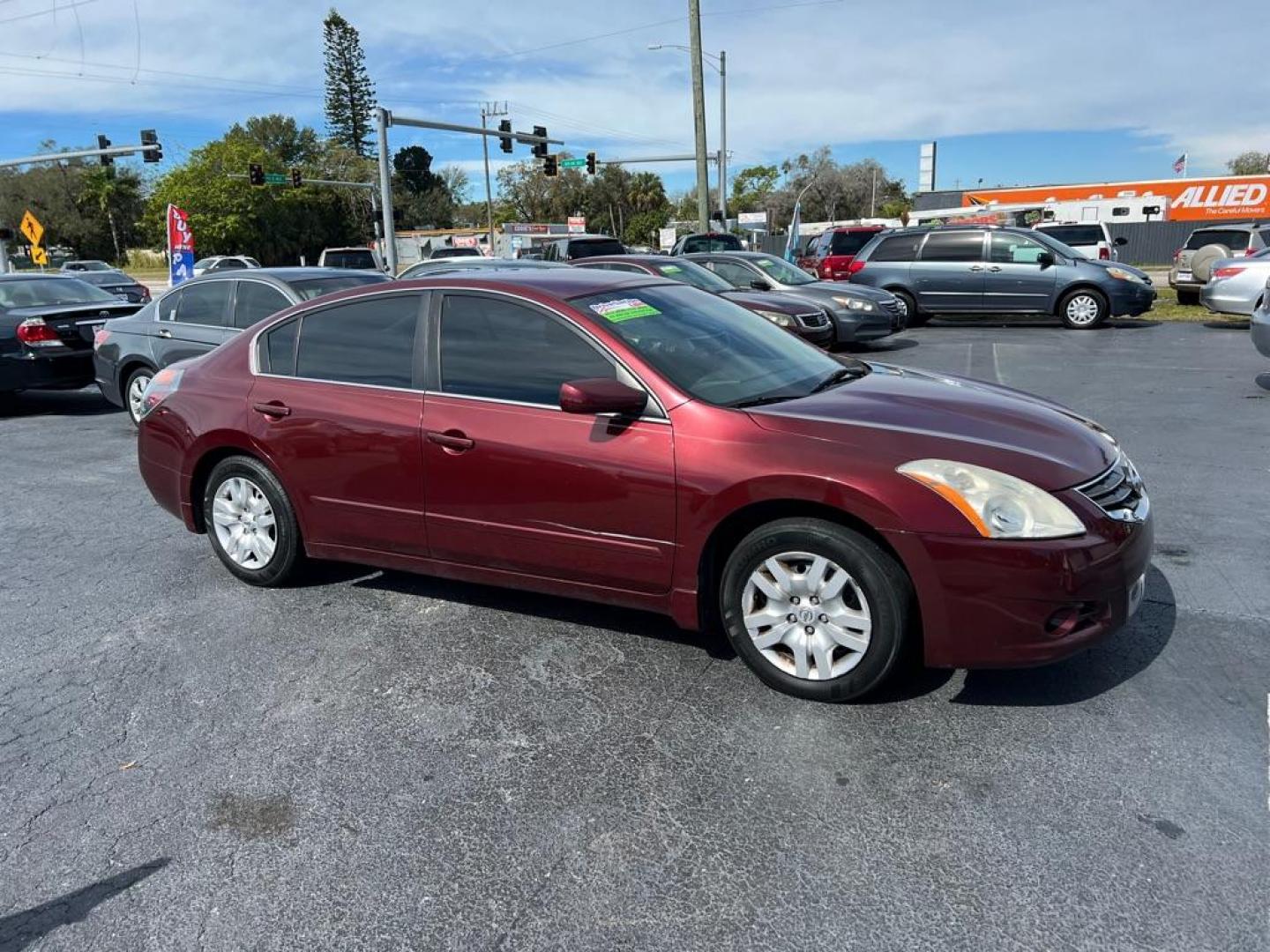 2011 RED NISSAN ALTIMA 2.5 S (1N4AL2AP4BC) with an 2.5L engine, Continuously Variable transmission, located at 2929 9th St. West, Bradenton, 34205, (941) 242-2810, 27.473591, -82.570679 - Photo#0