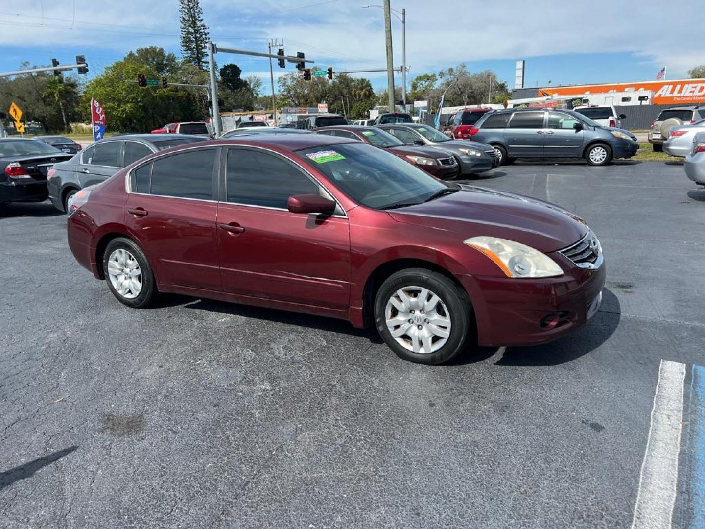 2011 RED NISSAN ALTIMA 2.5 S (1N4AL2AP4BC) with an 2.5L engine, Continuously Variable transmission, located at 2929 9th St. West, Bradenton, 34205, (941) 242-2810, 27.473591, -82.570679 - Photo#1