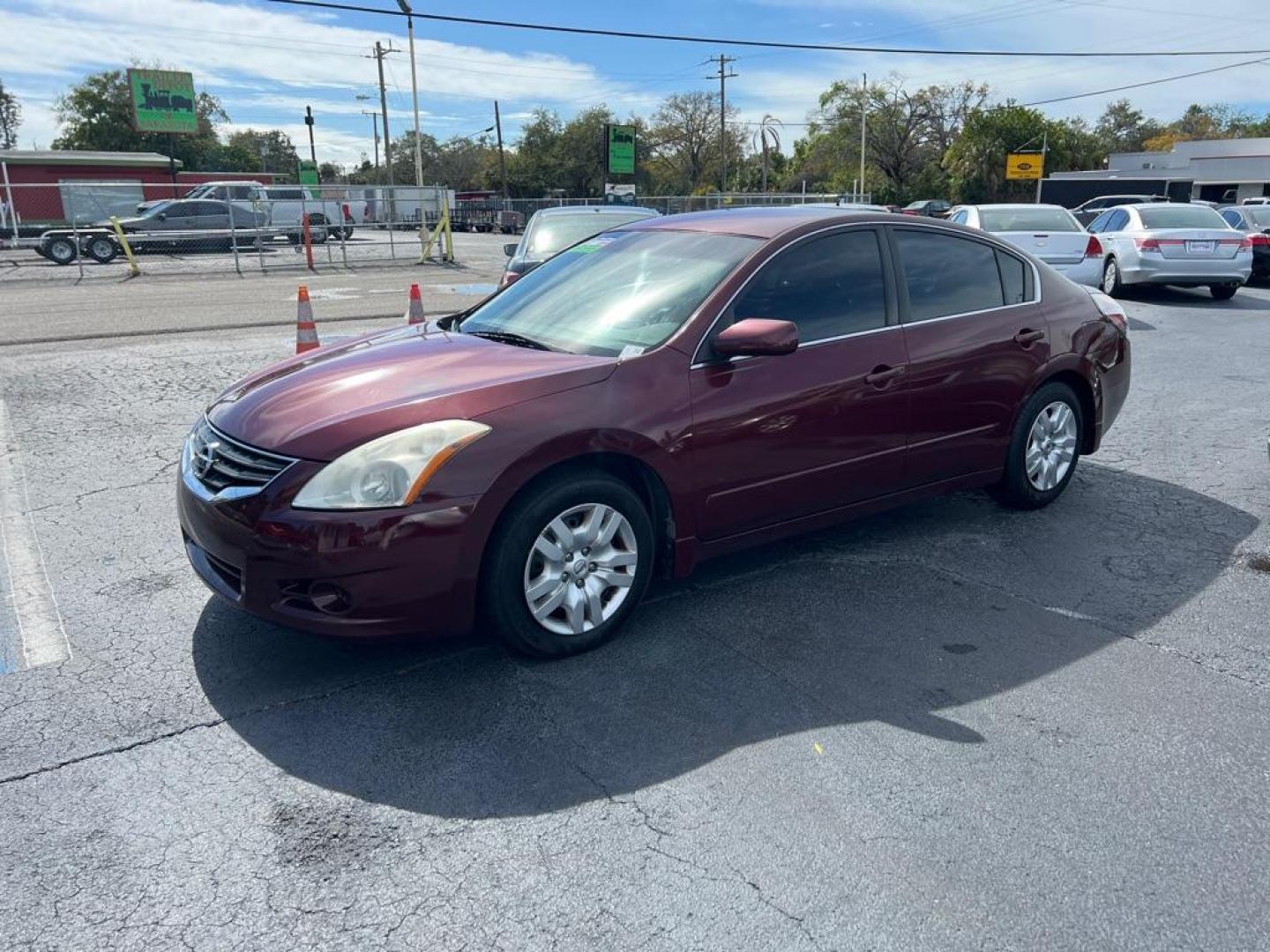 2011 RED NISSAN ALTIMA 2.5 S (1N4AL2AP4BC) with an 2.5L engine, Continuously Variable transmission, located at 2929 9th St. West, Bradenton, 34205, (941) 242-2810, 27.473591, -82.570679 - Photo#3