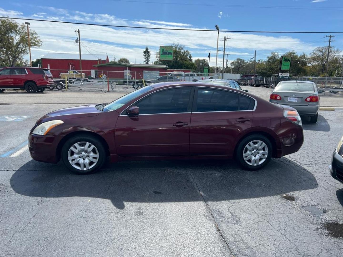 2011 RED NISSAN ALTIMA 2.5 S (1N4AL2AP4BC) with an 2.5L engine, Continuously Variable transmission, located at 2929 9th St. West, Bradenton, 34205, (941) 242-2810, 27.473591, -82.570679 - Photo#4