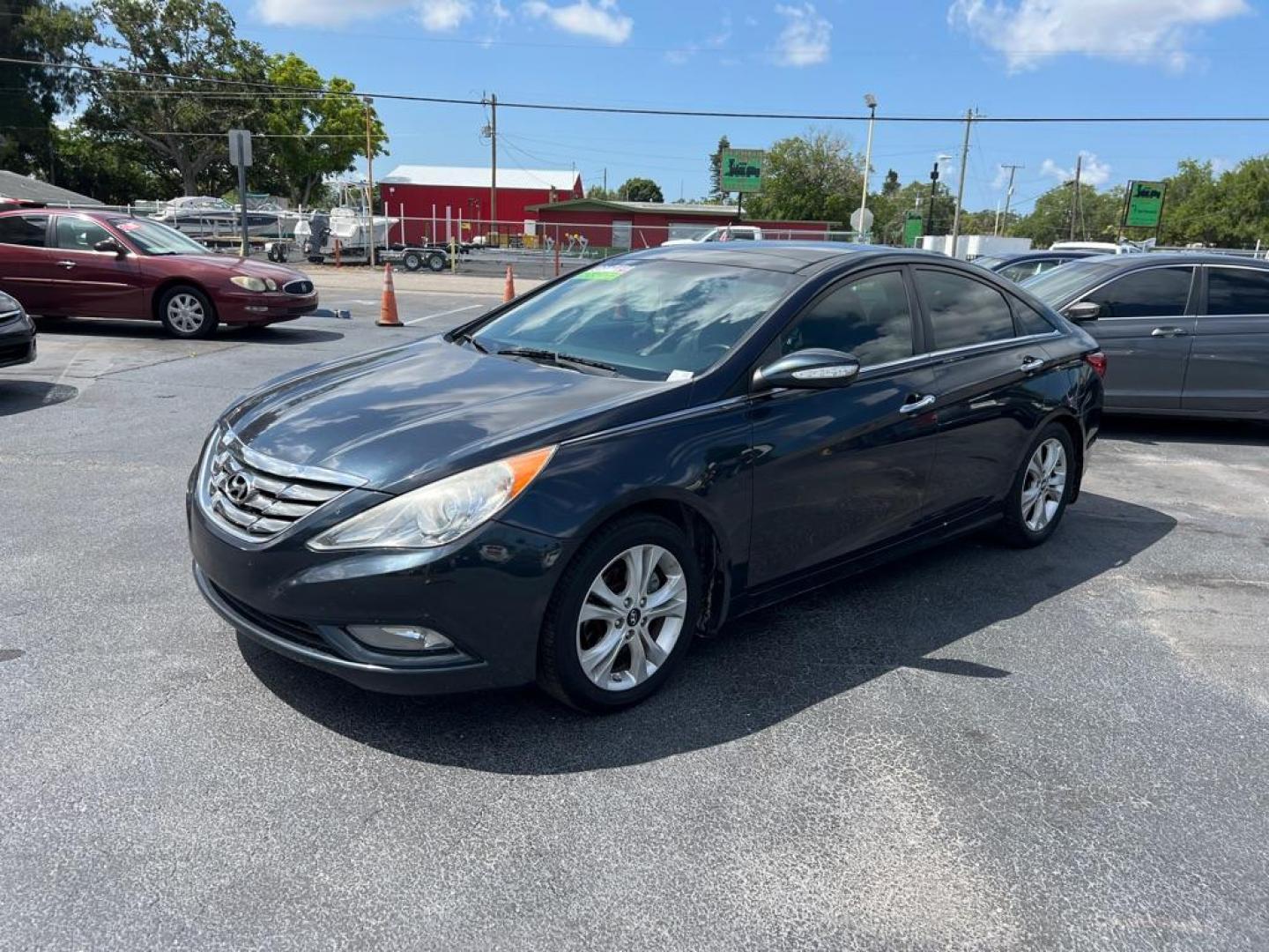 2013 BLUE HYUNDAI SONATA SE (5NPEC4ACXDH) with an 2.4L engine, Automatic transmission, located at 2929 9th St. West, Bradenton, 34205, (941) 242-2810, 27.473591, -82.570679 - Photo#3