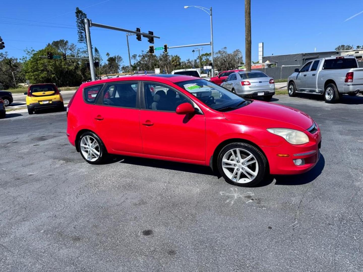 2009 RED HYUNDAI ELANTRA TOURING HATCHBACK (KMHDC86E49U) with an 2.0L engine, Automatic transmission, located at 2929 9th St. West, Bradenton, 34205, (941) 242-2810, 27.473591, -82.570679 - Thanks for inquring into DriveNation USA! All vehicles listed can be viewed at www.drivenationusa.com for vehicle history reports and additonal info. We cannot quote any terms such as down payments or monthly payments without an application. You can apply directly at www.drivenationusa.com or by con - Photo#1