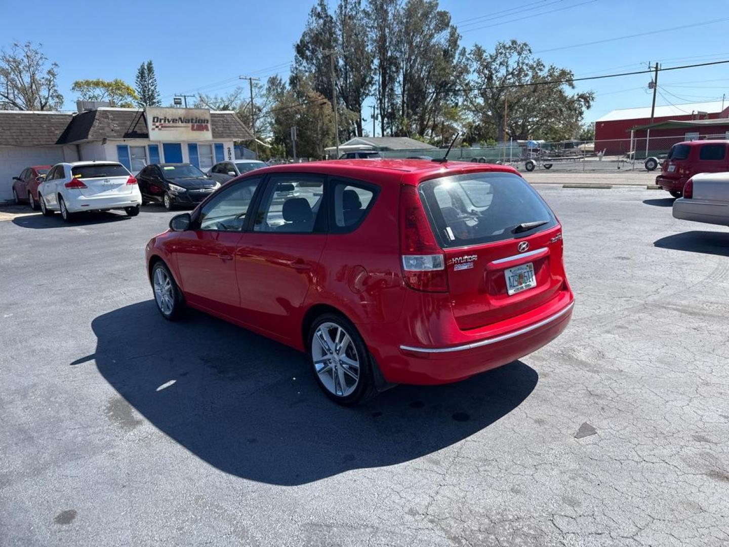 2009 RED HYUNDAI ELANTRA TOURING HATCHBACK (KMHDC86E49U) with an 2.0L engine, Automatic transmission, located at 2929 9th St. West, Bradenton, 34205, (941) 242-2810, 27.473591, -82.570679 - Thanks for inquring into DriveNation USA! All vehicles listed can be viewed at www.drivenationusa.com for vehicle history reports and additonal info. We cannot quote any terms such as down payments or monthly payments without an application. You can apply directly at www.drivenationusa.com or by con - Photo#5