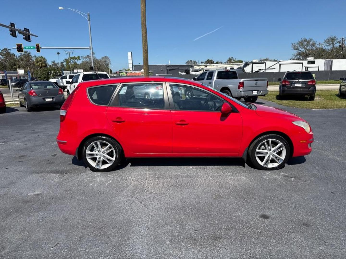 2009 RED HYUNDAI ELANTRA TOURING HATCHBACK (KMHDC86E49U) with an 2.0L engine, Automatic transmission, located at 2929 9th St. West, Bradenton, 34205, (941) 242-2810, 27.473591, -82.570679 - Thanks for inquring into DriveNation USA! All vehicles listed can be viewed at www.drivenationusa.com for vehicle history reports and additonal info. We cannot quote any terms such as down payments or monthly payments without an application. You can apply directly at www.drivenationusa.com or by con - Photo#8