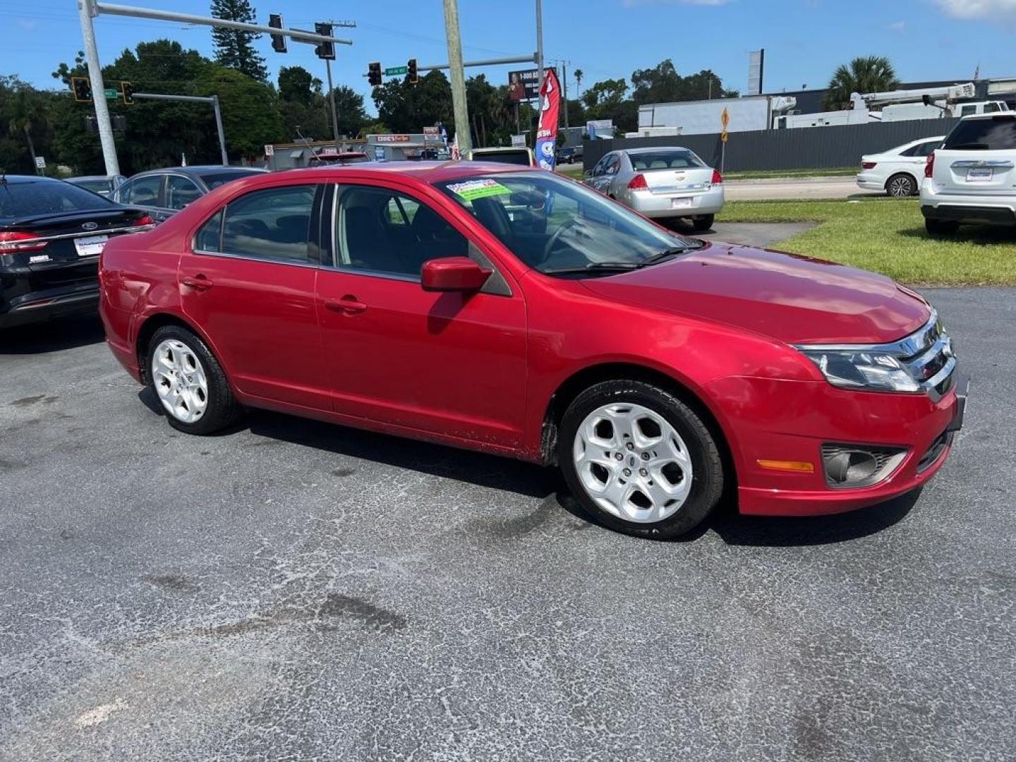 2010 RED FORD FUSION SE (3FAHP0HAXAR) with an 2.5L engine, Automatic transmission, located at 2929 9th St. West, Bradenton, 34205, (941) 242-2810, 27.473591, -82.570679 - Photo#0