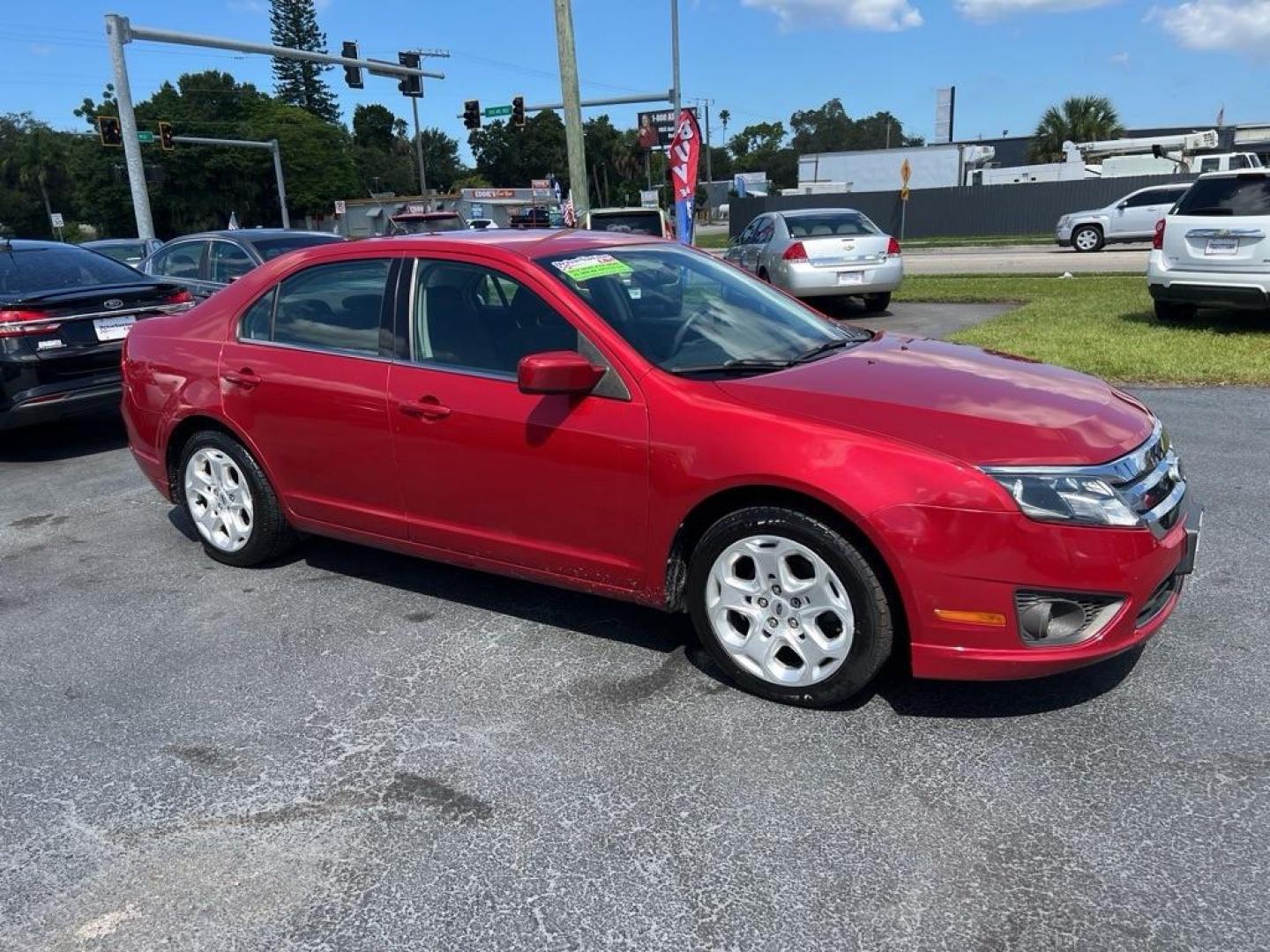 2010 RED FORD FUSION SE (3FAHP0HAXAR) with an 2.5L engine, Automatic transmission, located at 2929 9th St. West, Bradenton, 34205, (941) 242-2810, 27.473591, -82.570679 - Photo#1