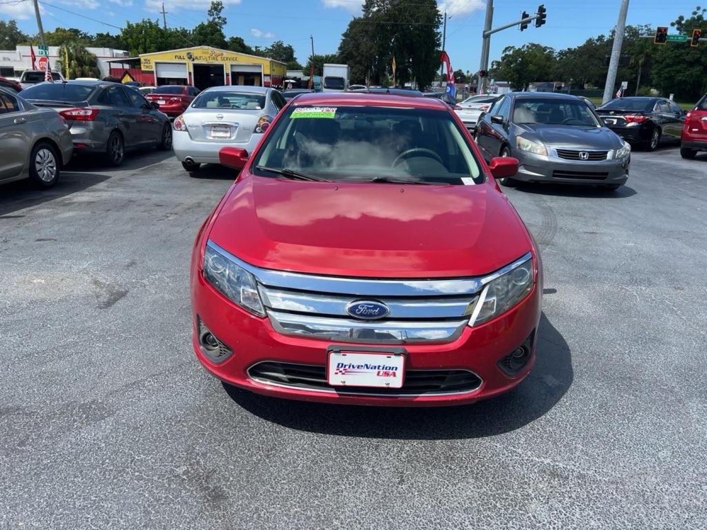 2010 RED FORD FUSION SE (3FAHP0HAXAR) with an 2.5L engine, Automatic transmission, located at 2929 9th St. West, Bradenton, 34205, (941) 242-2810, 27.473591, -82.570679 - Photo#2