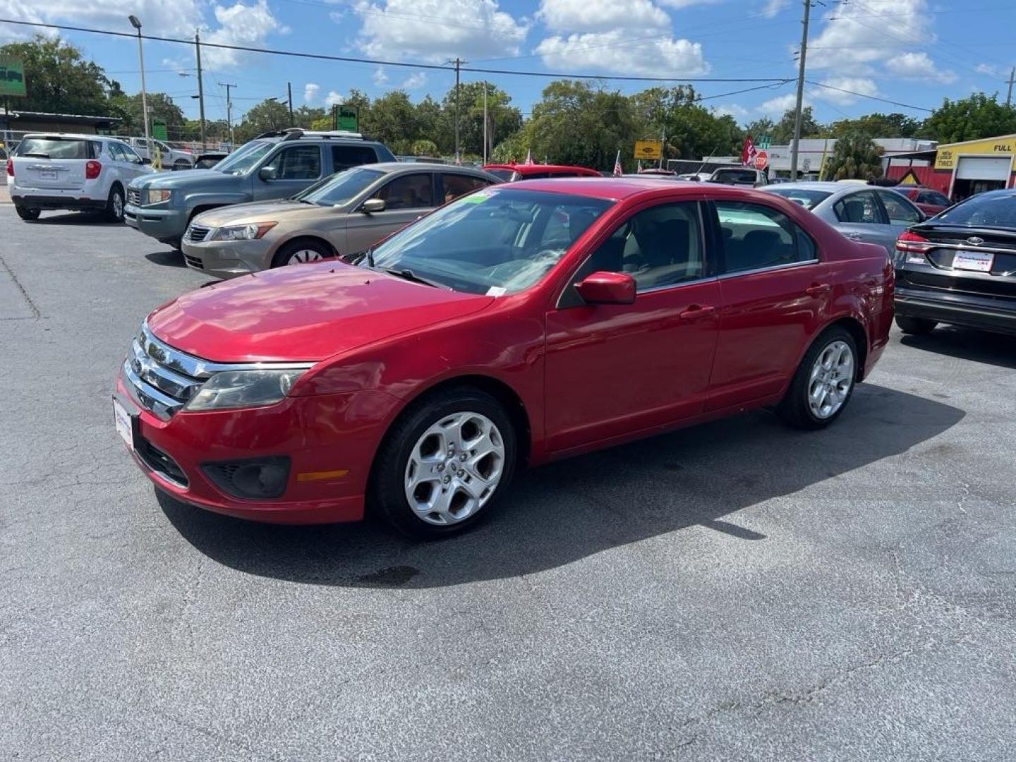 2010 RED FORD FUSION SE (3FAHP0HAXAR) with an 2.5L engine, Automatic transmission, located at 2929 9th St. West, Bradenton, 34205, (941) 242-2810, 27.473591, -82.570679 - Photo#3