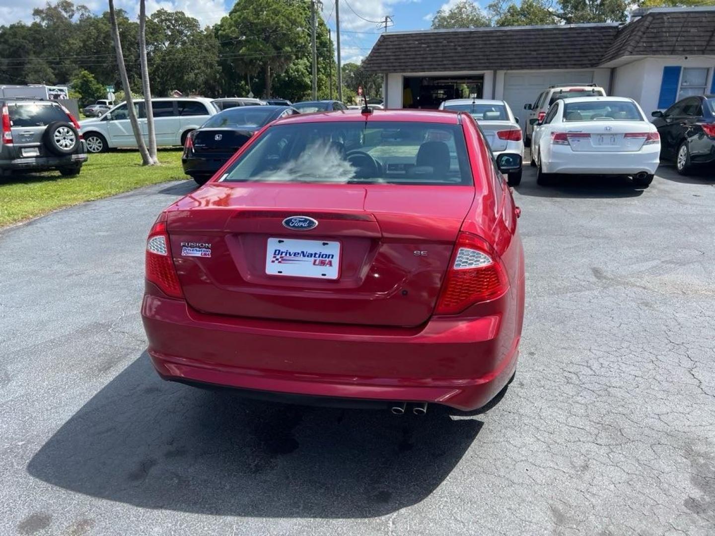 2010 RED FORD FUSION SE (3FAHP0HAXAR) with an 2.5L engine, Automatic transmission, located at 2929 9th St. West, Bradenton, 34205, (941) 242-2810, 27.473591, -82.570679 - Photo#6