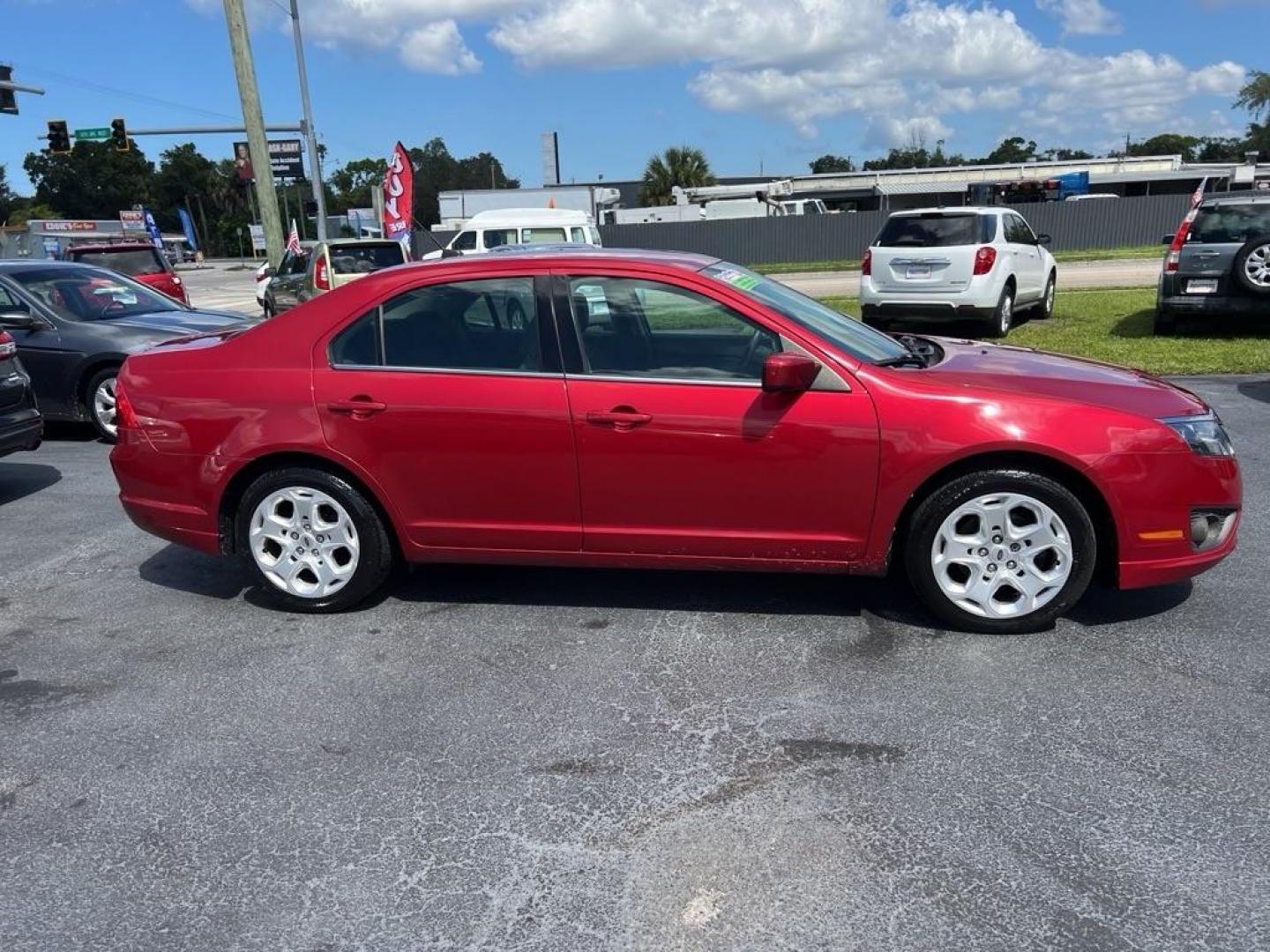 2010 RED FORD FUSION SE (3FAHP0HAXAR) with an 2.5L engine, Automatic transmission, located at 2929 9th St. West, Bradenton, 34205, (941) 242-2810, 27.473591, -82.570679 - Photo#7