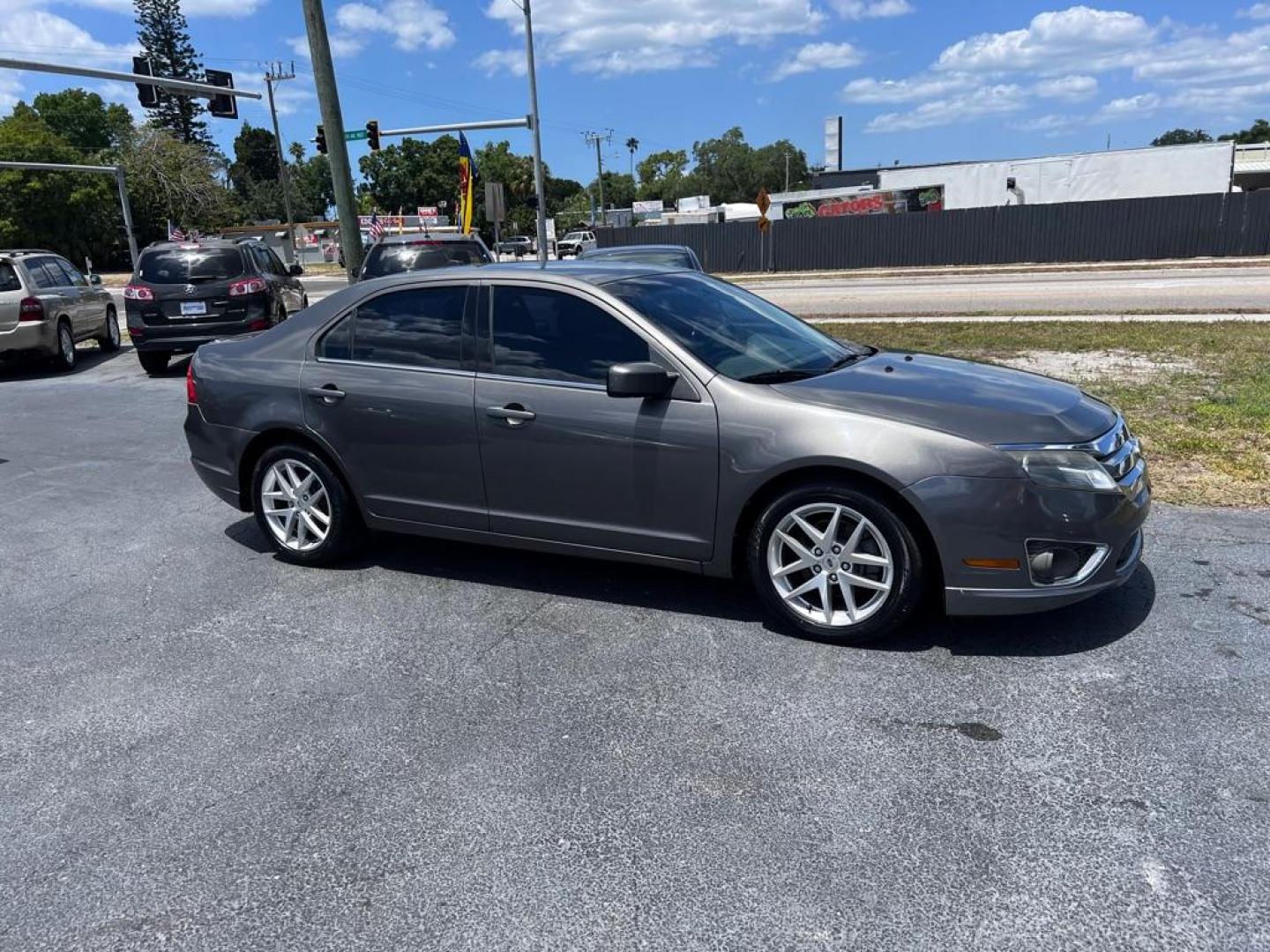 2012 GRAY FORD FUSION SEL (3FAHP0JA2CR) with an 2.5L engine, Automatic transmission, located at 2929 9th St. West, Bradenton, 34205, (941) 242-2810, 27.473591, -82.570679 - Photo#0