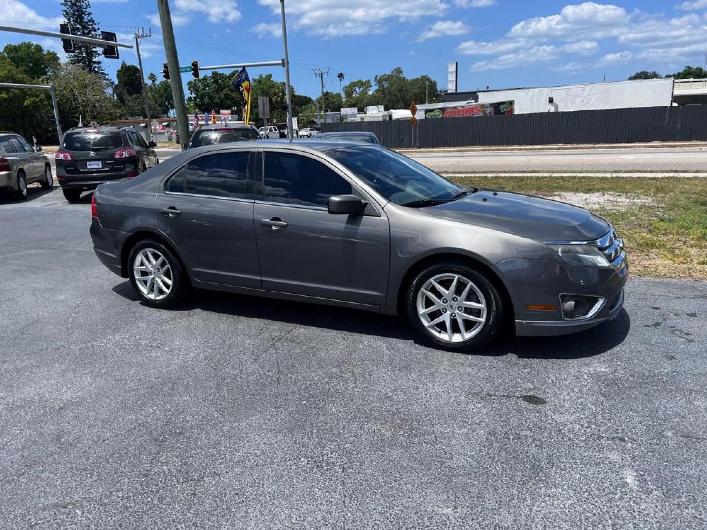 2012 GRAY FORD FUSION SEL (3FAHP0JA2CR) with an 2.5L engine, Automatic transmission, located at 2929 9th St. West, Bradenton, 34205, (941) 242-2810, 27.473591, -82.570679 - Photo#1