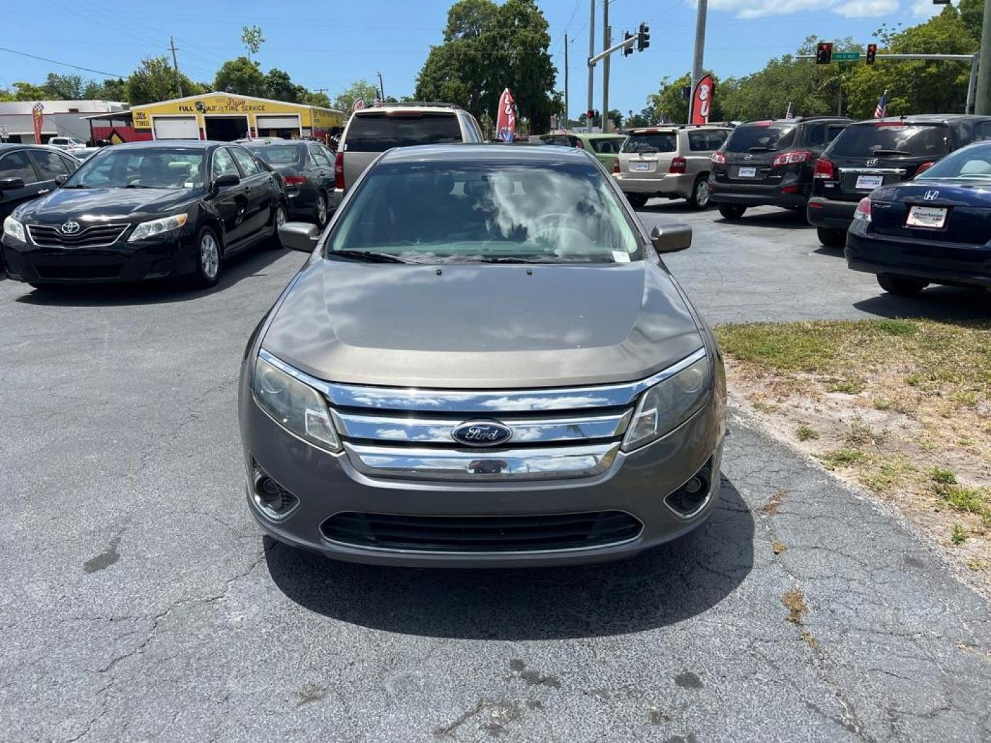 2012 GRAY FORD FUSION SEL (3FAHP0JA2CR) with an 2.5L engine, Automatic transmission, located at 2929 9th St. West, Bradenton, 34205, (941) 242-2810, 27.473591, -82.570679 - Photo#2