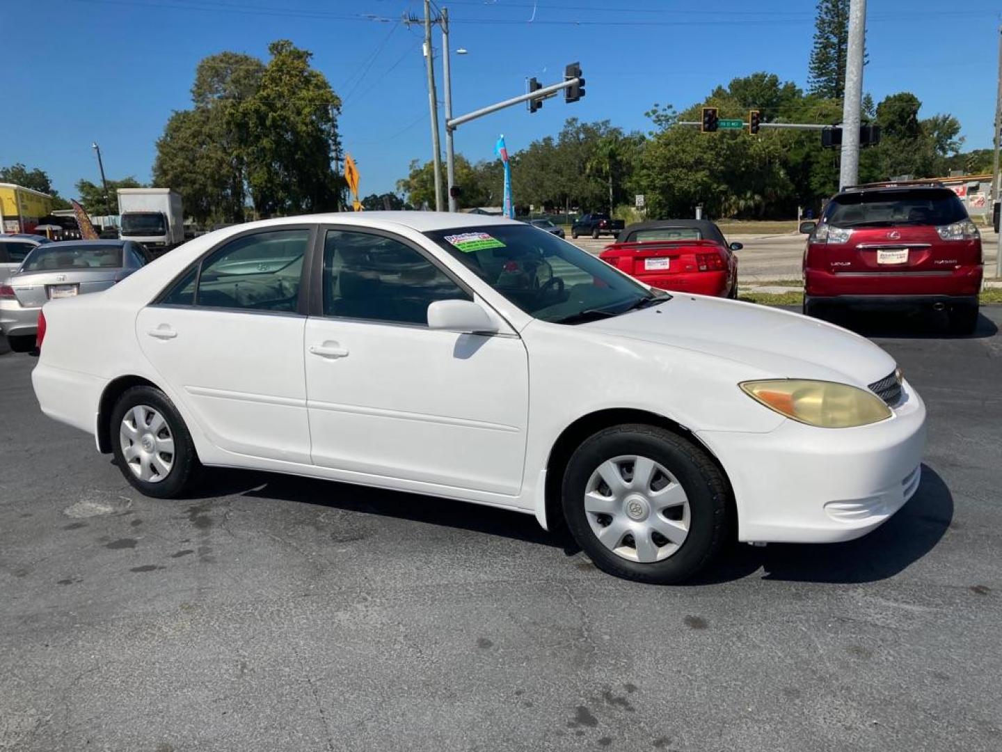 2003 WHITE TOYOTA CAMRY LE (4T1BE32K83U) with an 2.4L engine, Automatic transmission, located at 2929 9th St. West, Bradenton, 34205, (941) 242-2810, 27.473591, -82.570679 - Photo#0