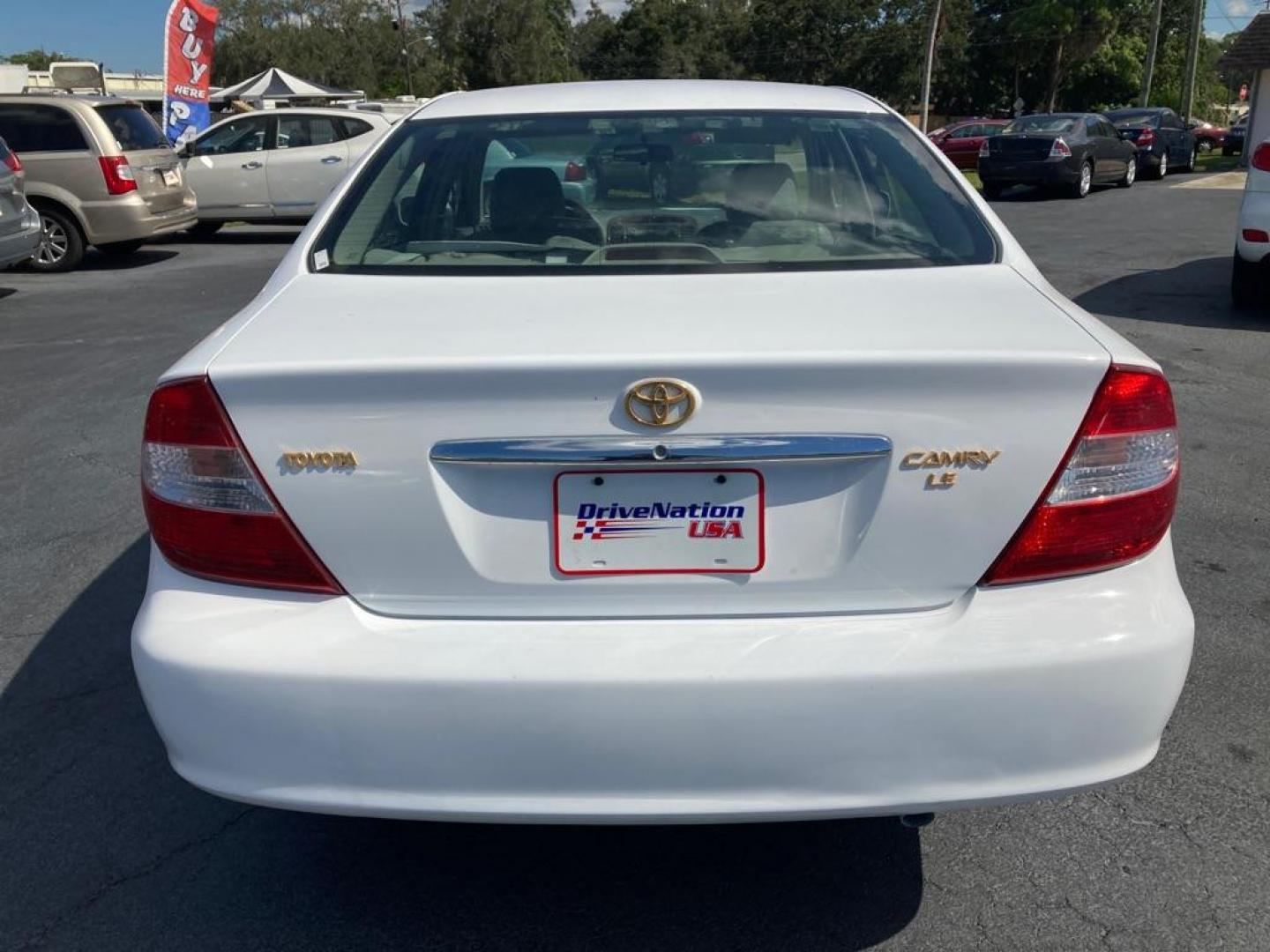 2003 WHITE TOYOTA CAMRY LE (4T1BE32K83U) with an 2.4L engine, Automatic transmission, located at 2929 9th St. West, Bradenton, 34205, (941) 242-2810, 27.473591, -82.570679 - Photo#4