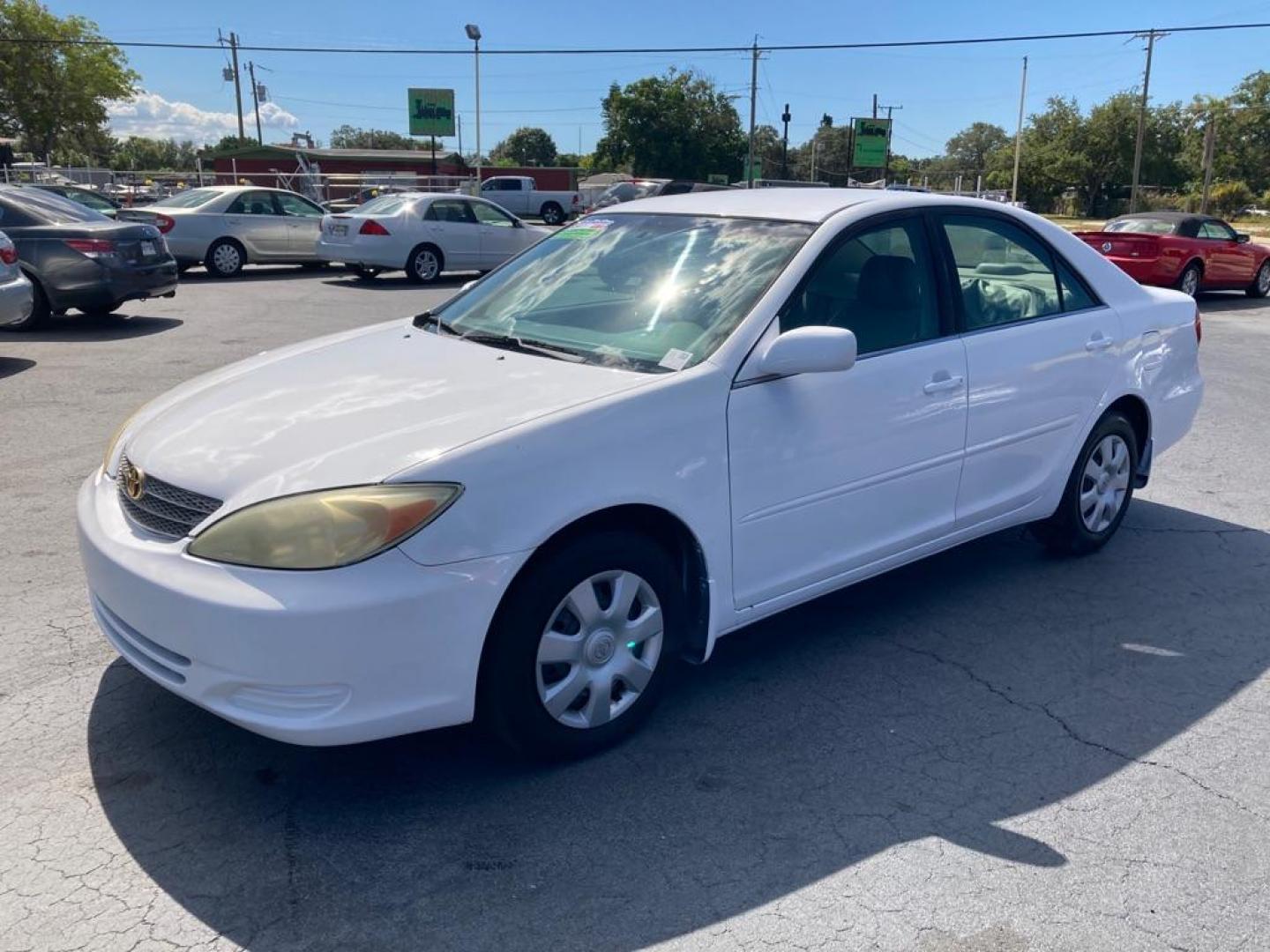 2003 WHITE TOYOTA CAMRY LE (4T1BE32K83U) with an 2.4L engine, Automatic transmission, located at 2929 9th St. West, Bradenton, 34205, (941) 242-2810, 27.473591, -82.570679 - Photo#7