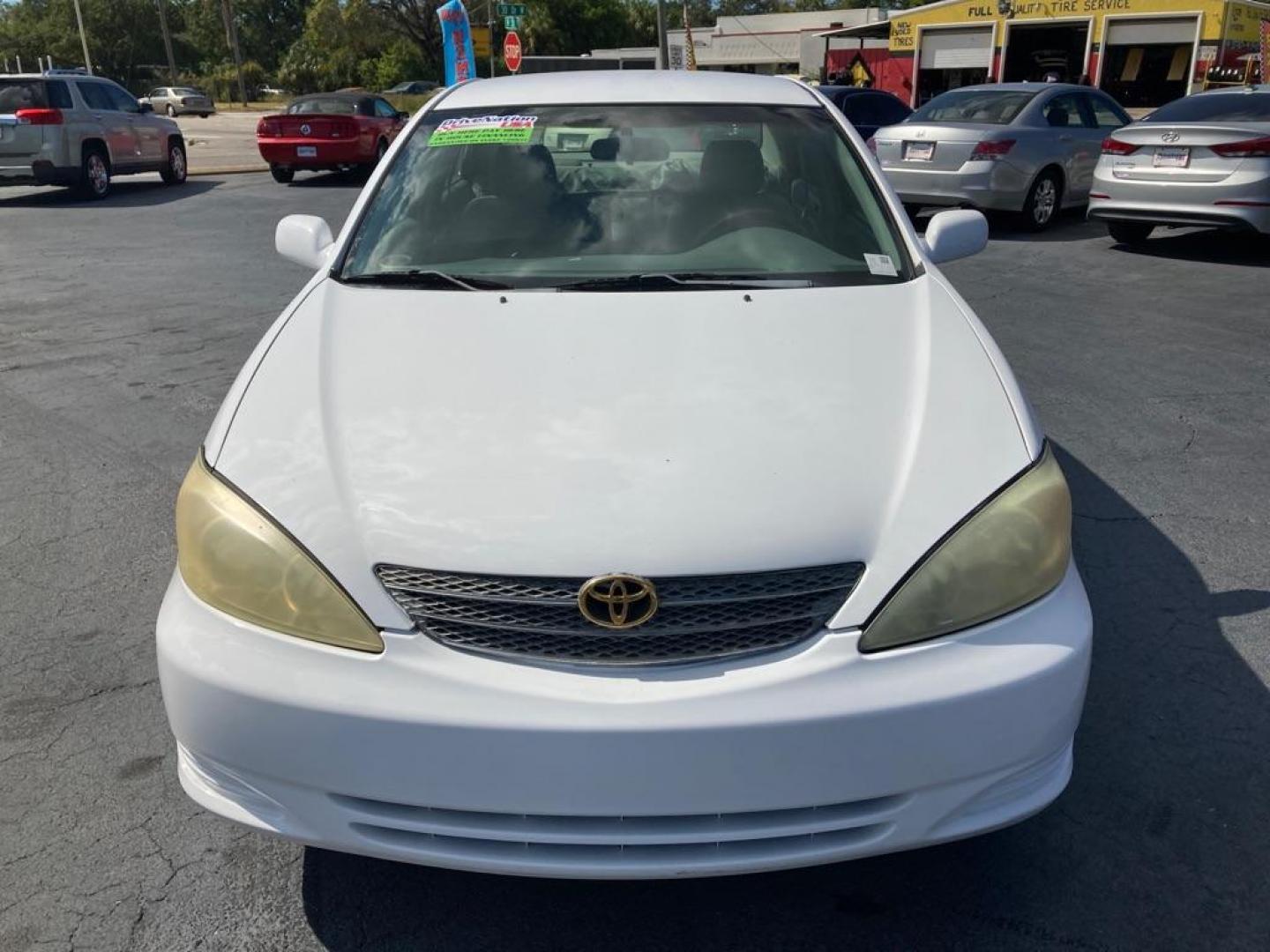 2003 WHITE TOYOTA CAMRY LE (4T1BE32K83U) with an 2.4L engine, Automatic transmission, located at 2929 9th St. West, Bradenton, 34205, (941) 242-2810, 27.473591, -82.570679 - Photo#8