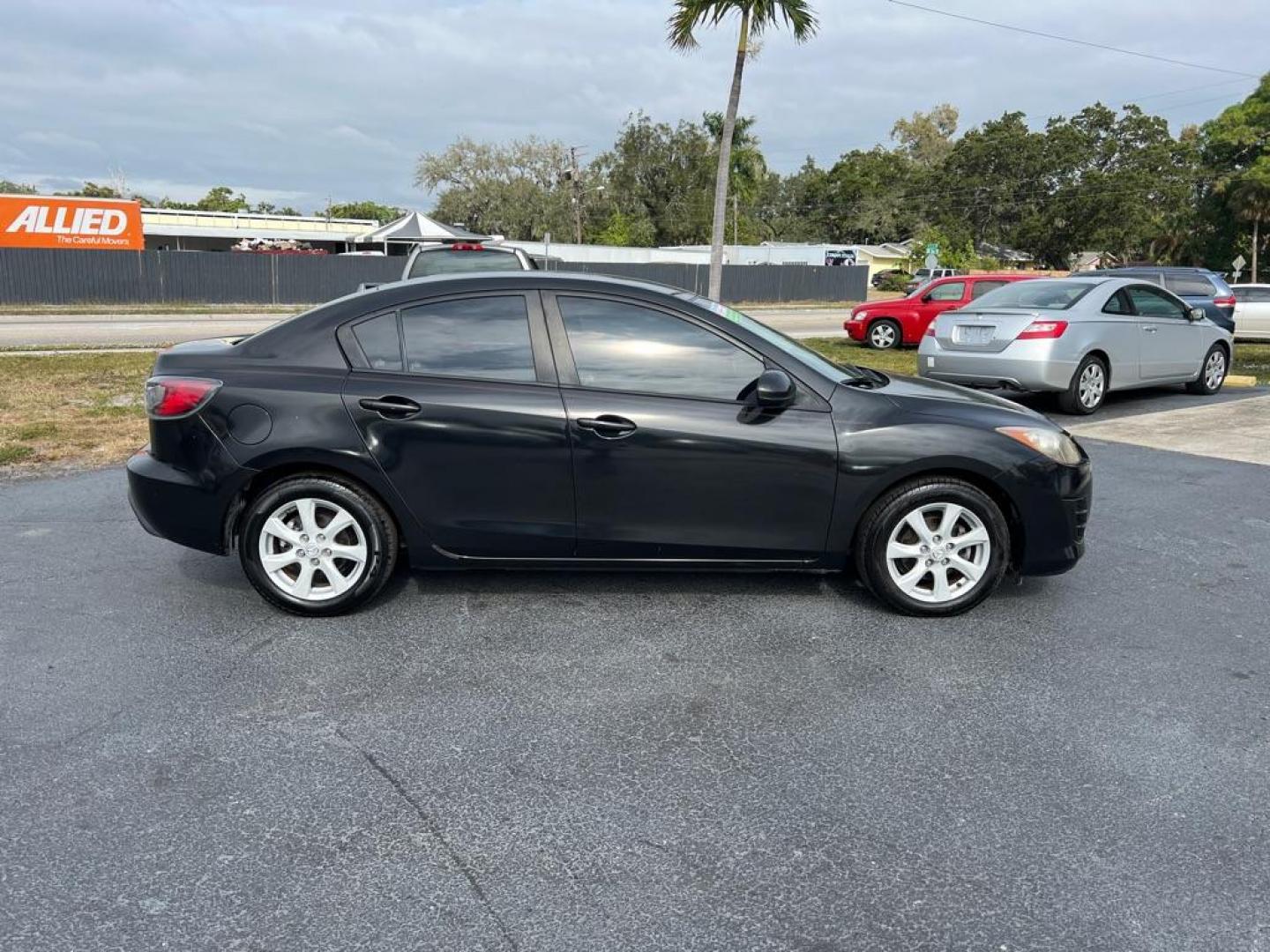 2010 BLACK MAZDA 3 I (JM1BL1SF9A1) with an 2.0L engine, Automatic transmission, located at 2929 9th St. West, Bradenton, 34205, (941) 242-2810, 27.473591, -82.570679 - Photo#10