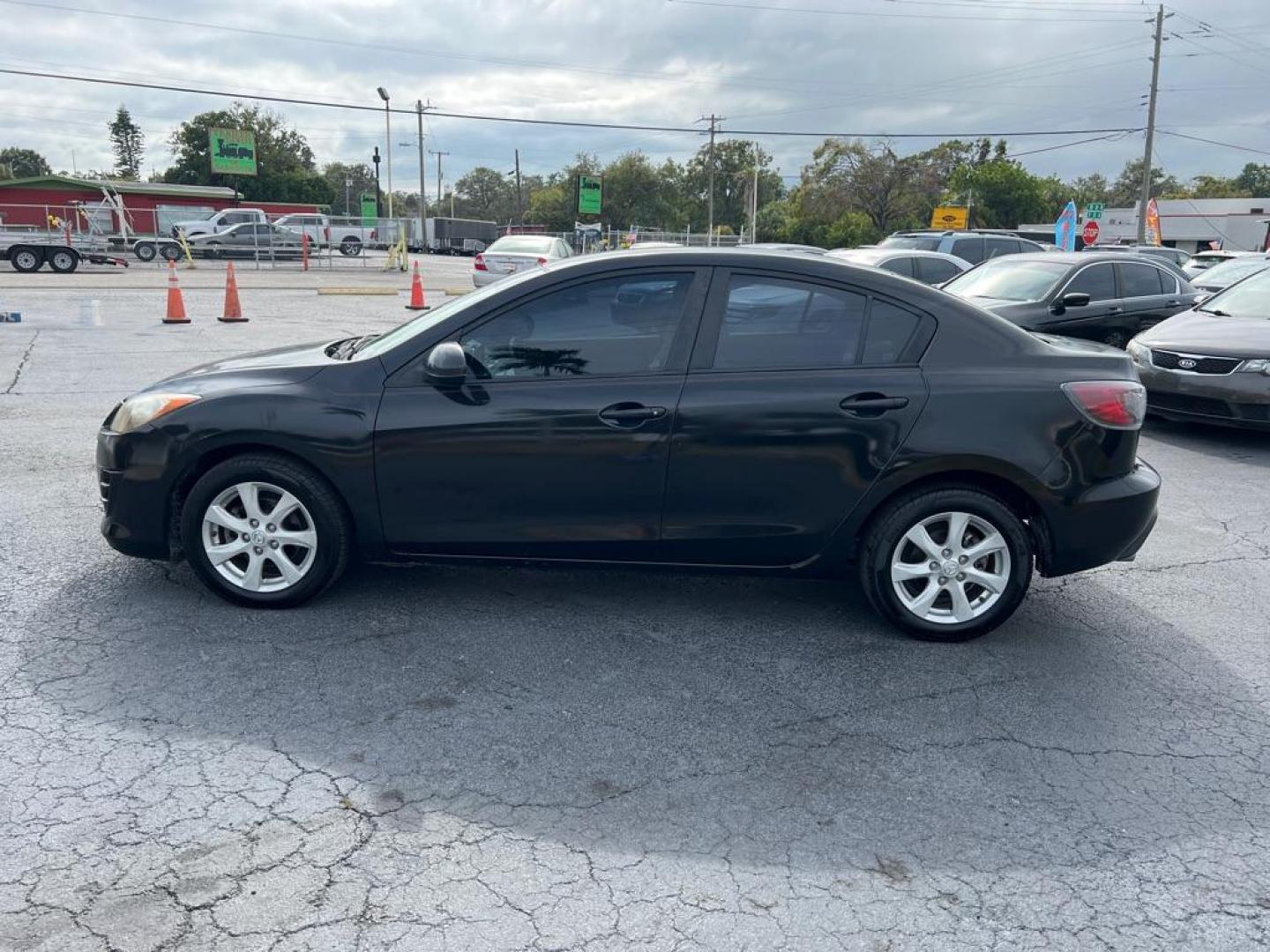 2010 BLACK MAZDA 3 I (JM1BL1SF9A1) with an 2.0L engine, Automatic transmission, located at 2929 9th St. West, Bradenton, 34205, (941) 242-2810, 27.473591, -82.570679 - Photo#6