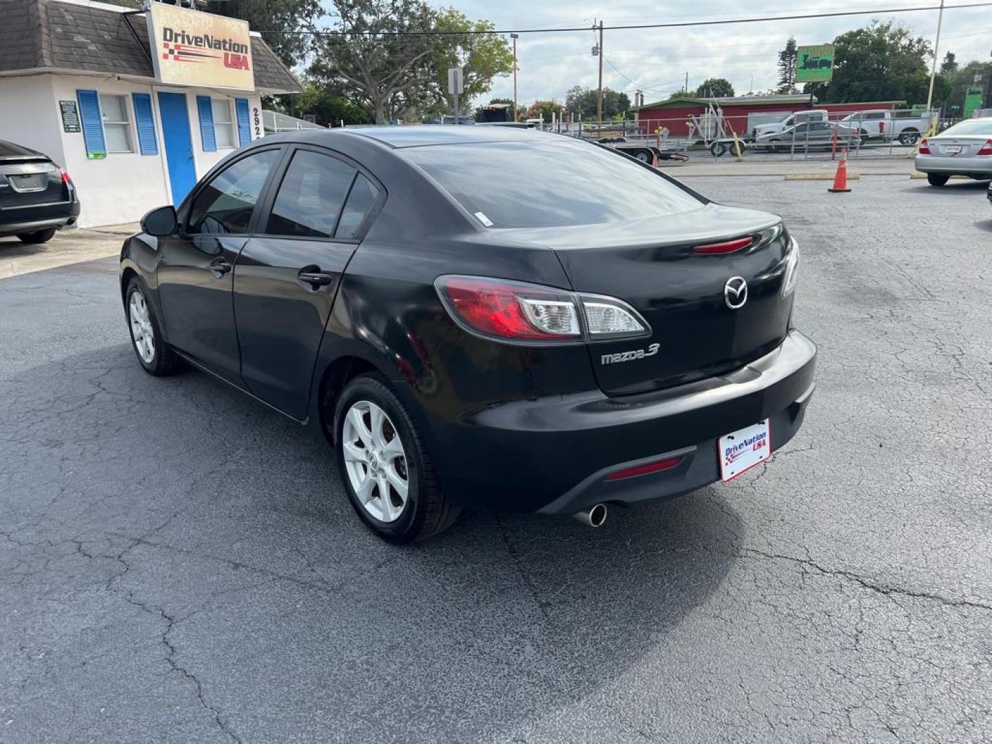 2010 BLACK MAZDA 3 I (JM1BL1SF9A1) with an 2.0L engine, Automatic transmission, located at 2929 9th St. West, Bradenton, 34205, (941) 242-2810, 27.473591, -82.570679 - Photo#7