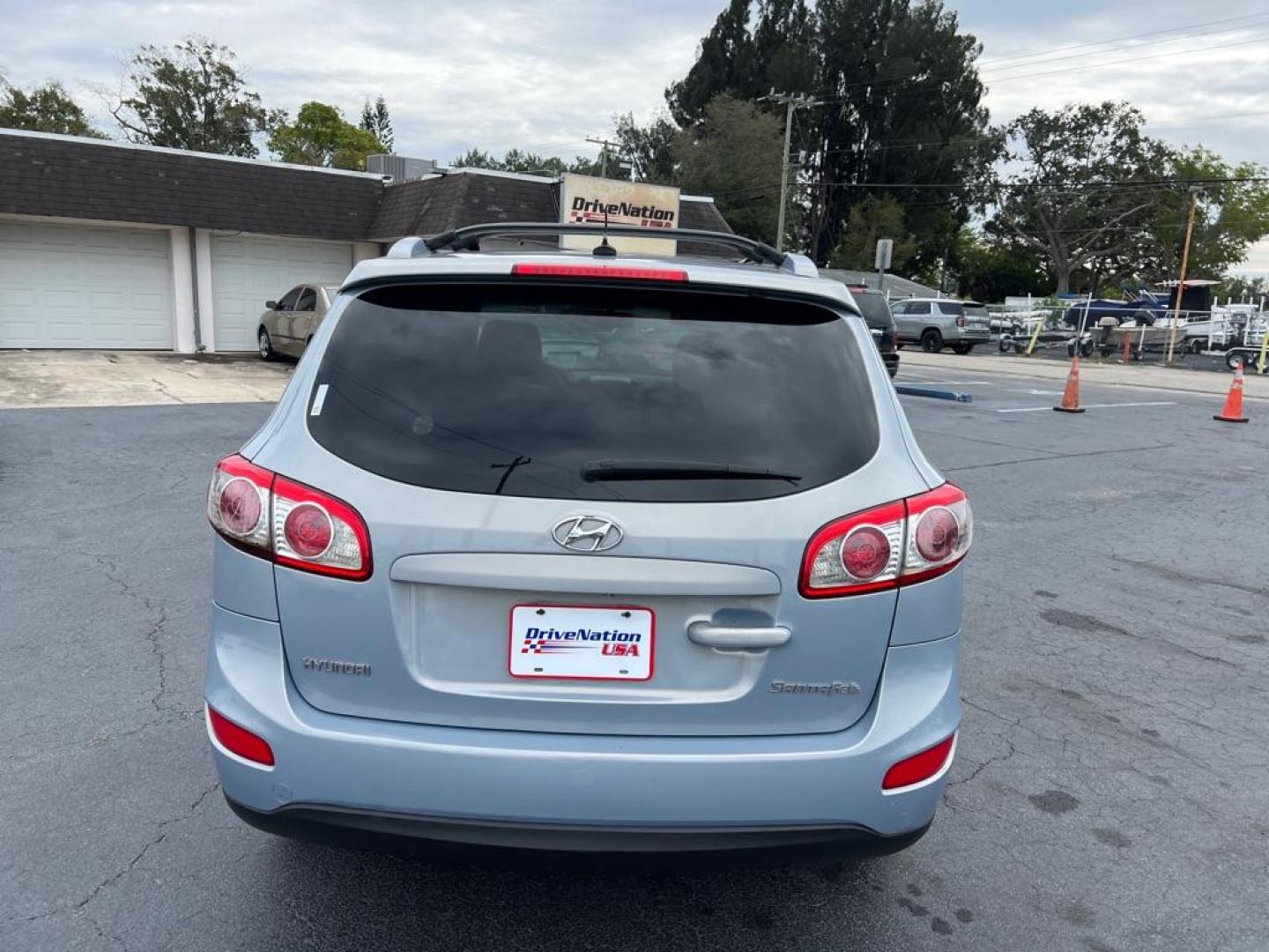 2010 BLUE HYUNDAI SANTA FE SE (5NMSH4AG4AH) with an 3.5L engine, Automatic transmission, located at 2929 9th St. West, Bradenton, 34205, (941) 242-2810, 27.473591, -82.570679 - Photo#7