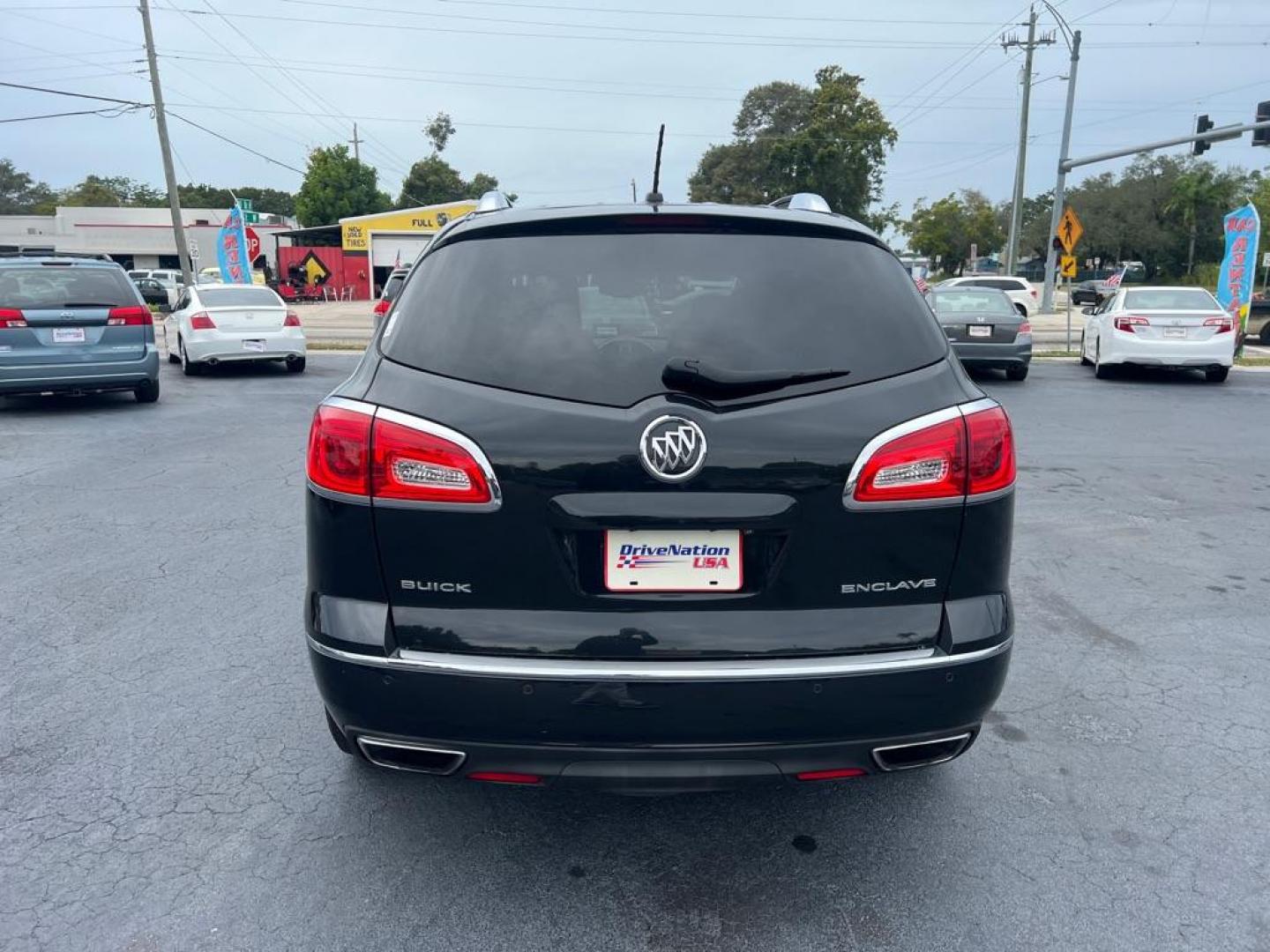 2013 BLACK BUICK ENCLAVE CXL (5GAKRBKD5DJ) with an 3.6L engine, Automatic transmission, located at 2929 9th St. West, Bradenton, 34205, (941) 242-2810, 27.473591, -82.570679 - Photo#7