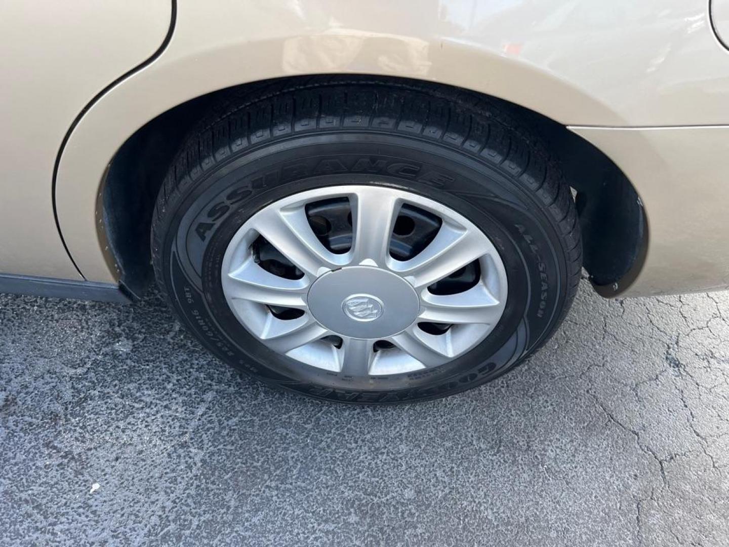 2005 TAN BUICK LACROSSE CX (2G4WC532351) with an 3.8L engine, Automatic transmission, located at 2929 9th St. West, Bradenton, 34205, (941) 242-2810, 27.473591, -82.570679 - Photo#9