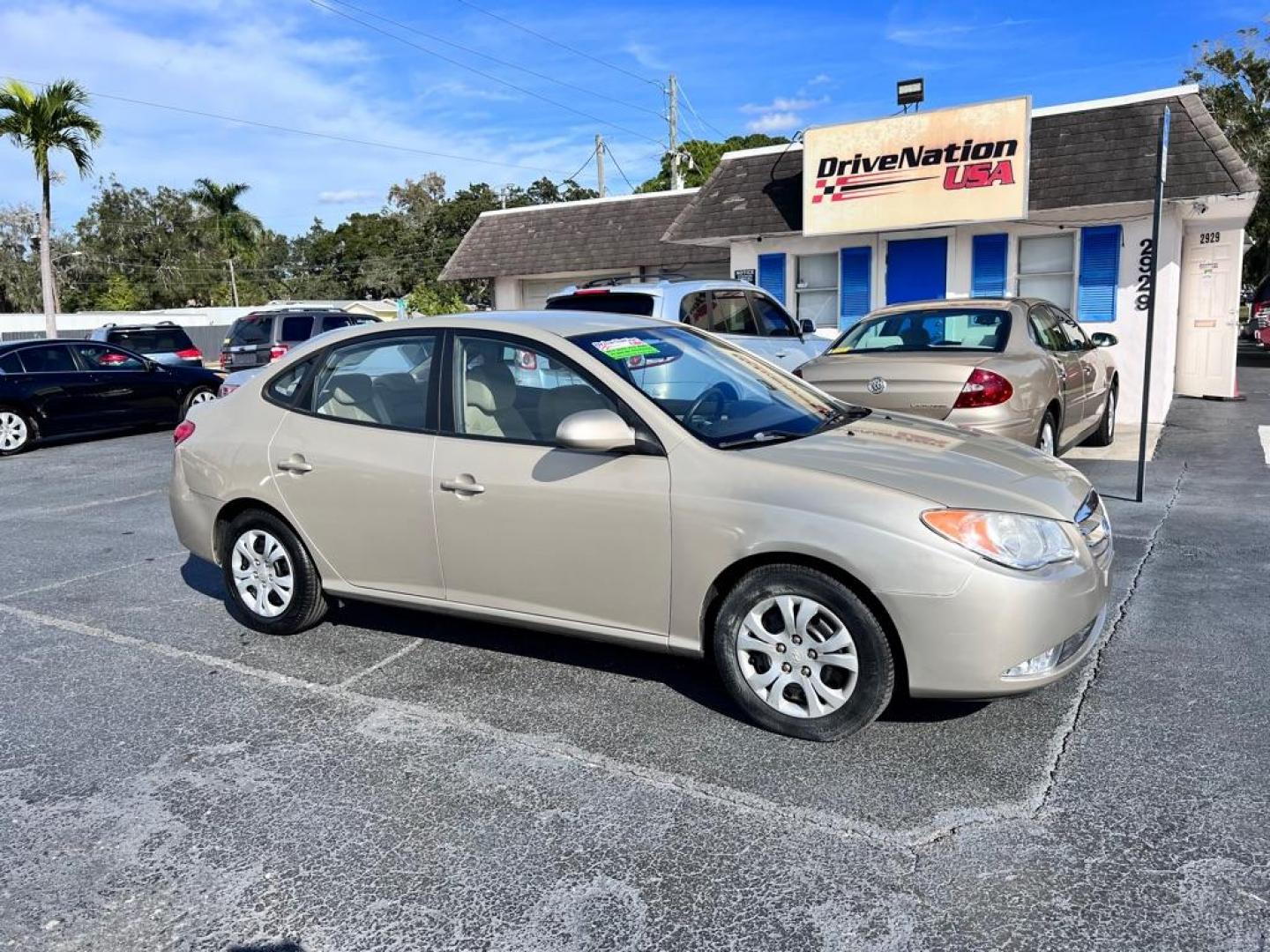 2010 TAN HYUNDAI ELANTRA BLUE (KMHDU4AD8AU) with an 2.0L engine, Automatic transmission, located at 2929 9th St. West, Bradenton, 34205, (941) 242-2810, 27.473591, -82.570679 - Photo#0