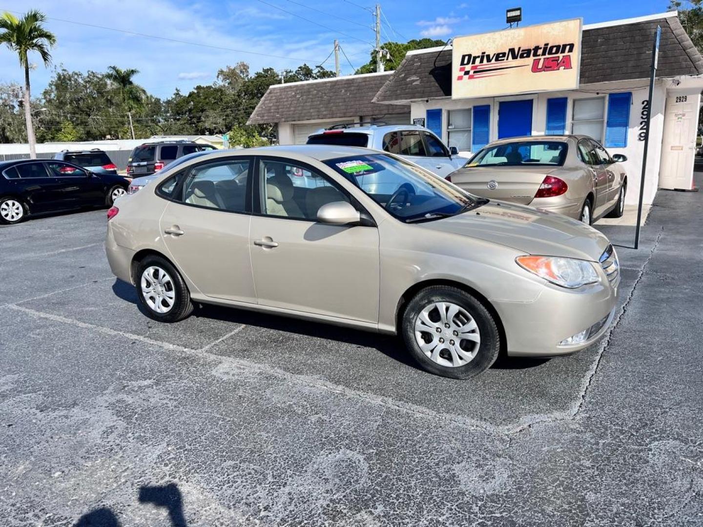 2010 TAN HYUNDAI ELANTRA BLUE (KMHDU4AD8AU) with an 2.0L engine, Automatic transmission, located at 2929 9th St. West, Bradenton, 34205, (941) 242-2810, 27.473591, -82.570679 - Photo#1