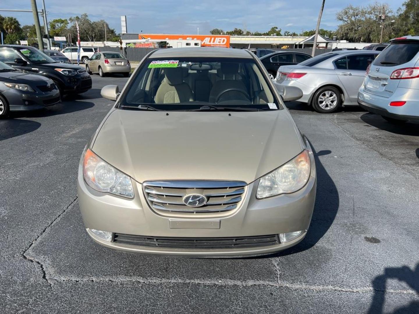 2010 TAN HYUNDAI ELANTRA BLUE (KMHDU4AD8AU) with an 2.0L engine, Automatic transmission, located at 2929 9th St. West, Bradenton, 34205, (941) 242-2810, 27.473591, -82.570679 - Photo#2