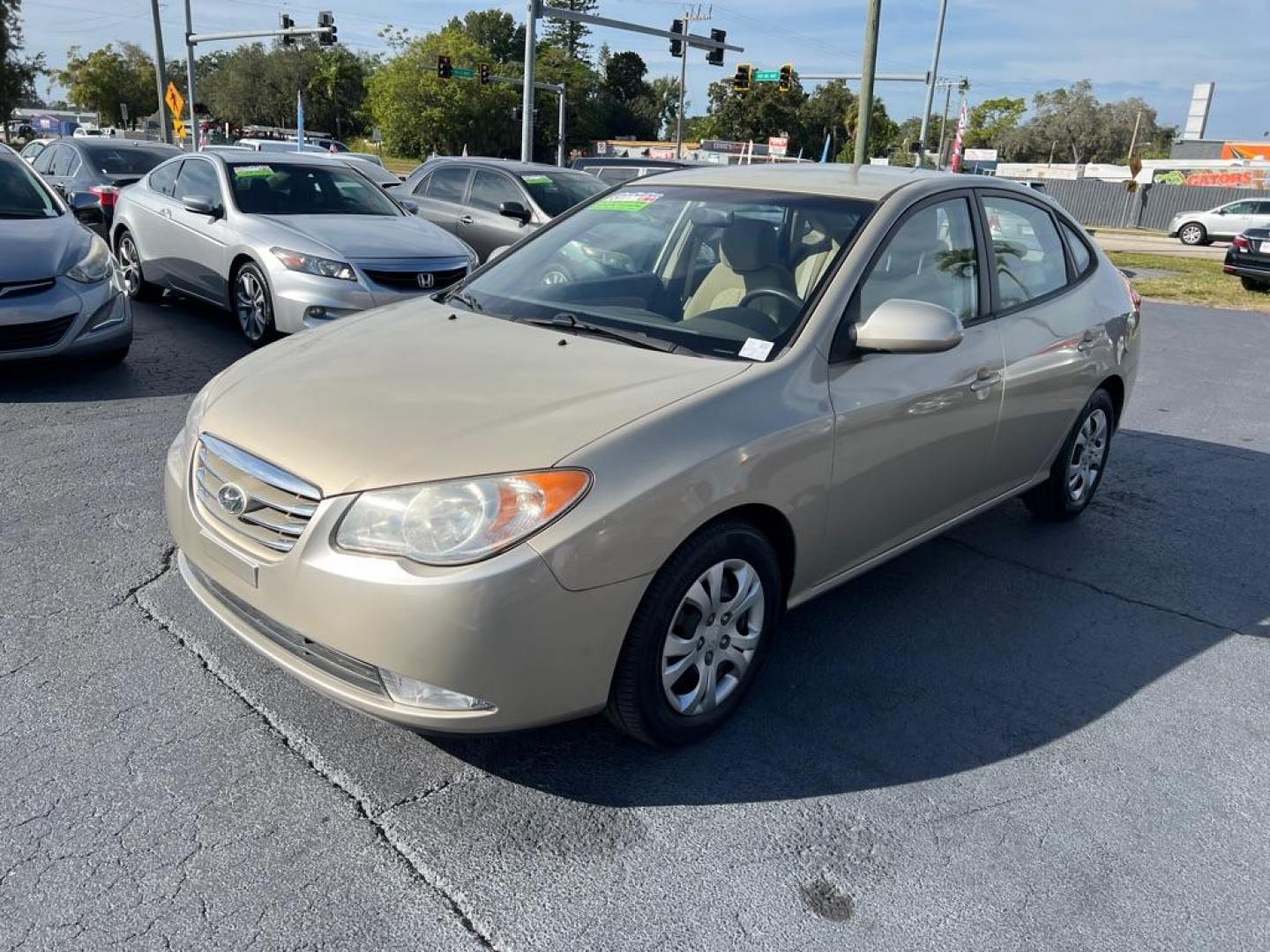 2010 TAN HYUNDAI ELANTRA BLUE (KMHDU4AD8AU) with an 2.0L engine, Automatic transmission, located at 2929 9th St. West, Bradenton, 34205, (941) 242-2810, 27.473591, -82.570679 - Photo#3