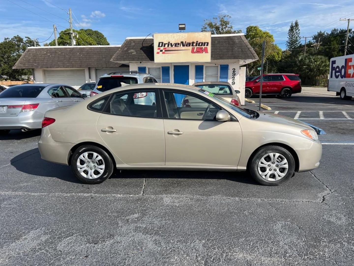 2010 TAN HYUNDAI ELANTRA BLUE (KMHDU4AD8AU) with an 2.0L engine, Automatic transmission, located at 2929 9th St. West, Bradenton, 34205, (941) 242-2810, 27.473591, -82.570679 - Photo#7