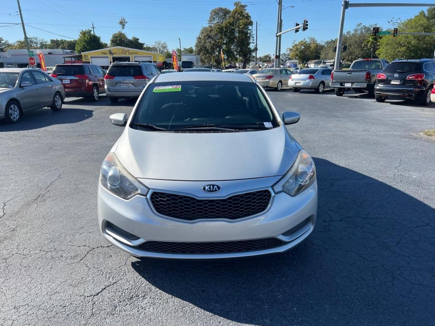 2016 GRAY KIA FORTE LX (KNAFK4A62G5) with an 1.8L engine, Automatic transmission, located at 2929 9th St. West, Bradenton, 34205, (941) 242-2810, 27.473591, -82.570679 - Photo#2