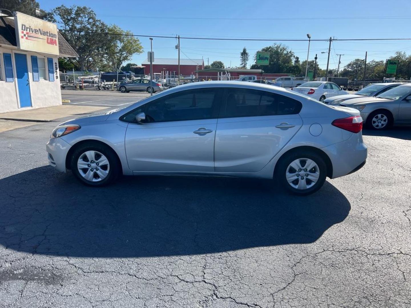 2016 GRAY KIA FORTE LX (KNAFK4A62G5) with an 1.8L engine, Automatic transmission, located at 2929 9th St. West, Bradenton, 34205, (941) 242-2810, 27.473591, -82.570679 - Photo#4