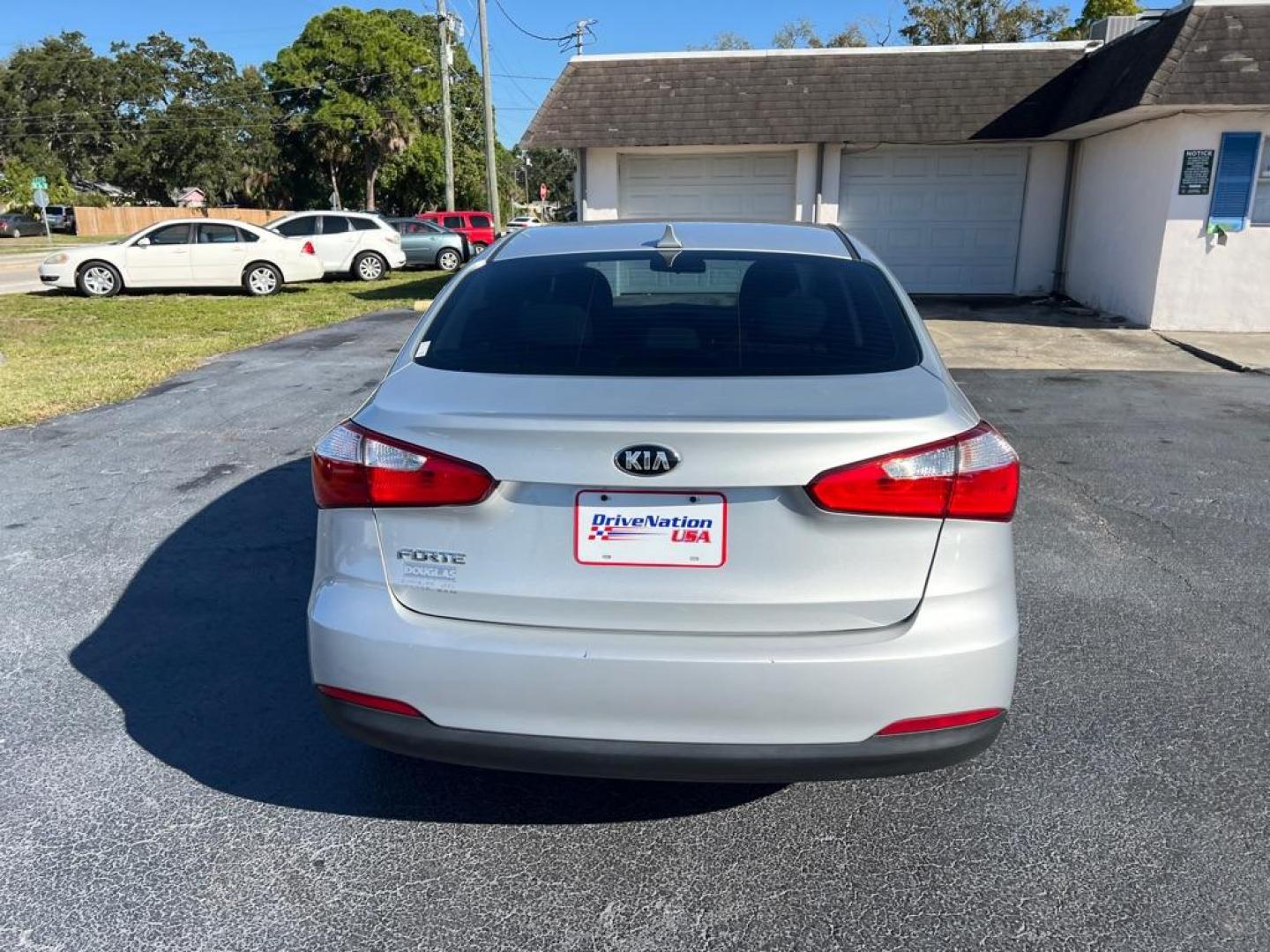 2016 GRAY KIA FORTE LX (KNAFK4A62G5) with an 1.8L engine, Automatic transmission, located at 2929 9th St. West, Bradenton, 34205, (941) 242-2810, 27.473591, -82.570679 - Photo#6