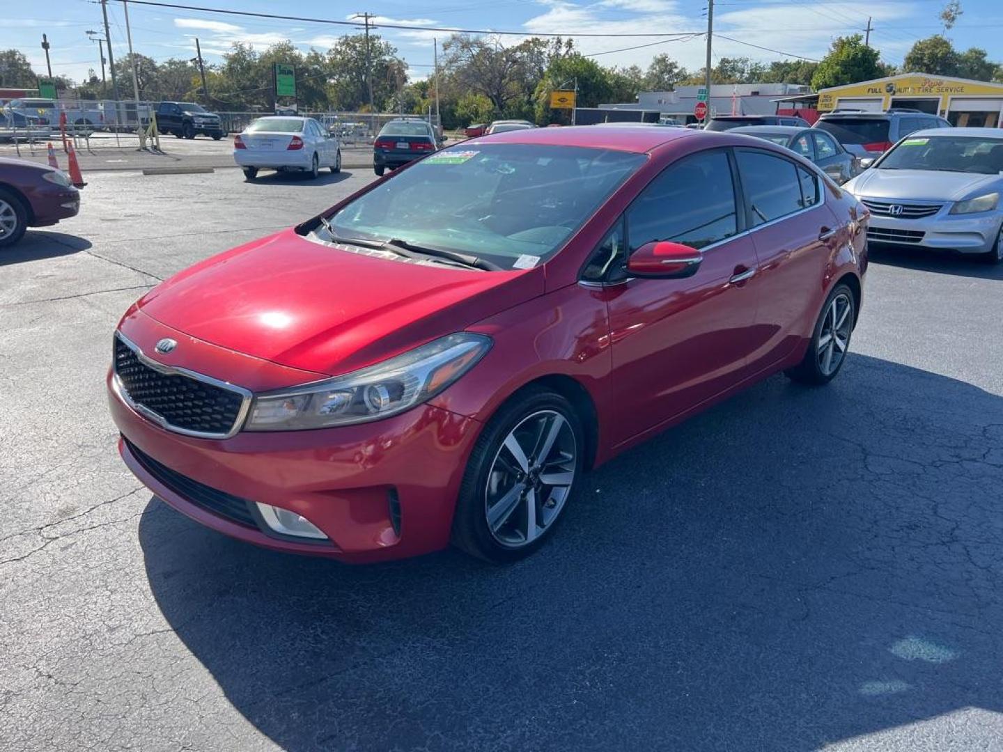 2018 RED KIA FORTE EX (3KPFL4A81JE) with an 2.0L engine, Automatic transmission, located at 2929 9th St. West, Bradenton, 34205, (941) 242-2810, 27.473591, -82.570679 - Thanks for inquring into DriveNation USA! All vehicles listed can be viewed at www.drivenationusa.com for vehicle history reports and additonal info. We cannot quote any terms such as down payments or monthly payments without an application. You can apply directly at www.drivenationusa.com or by con - Photo#4