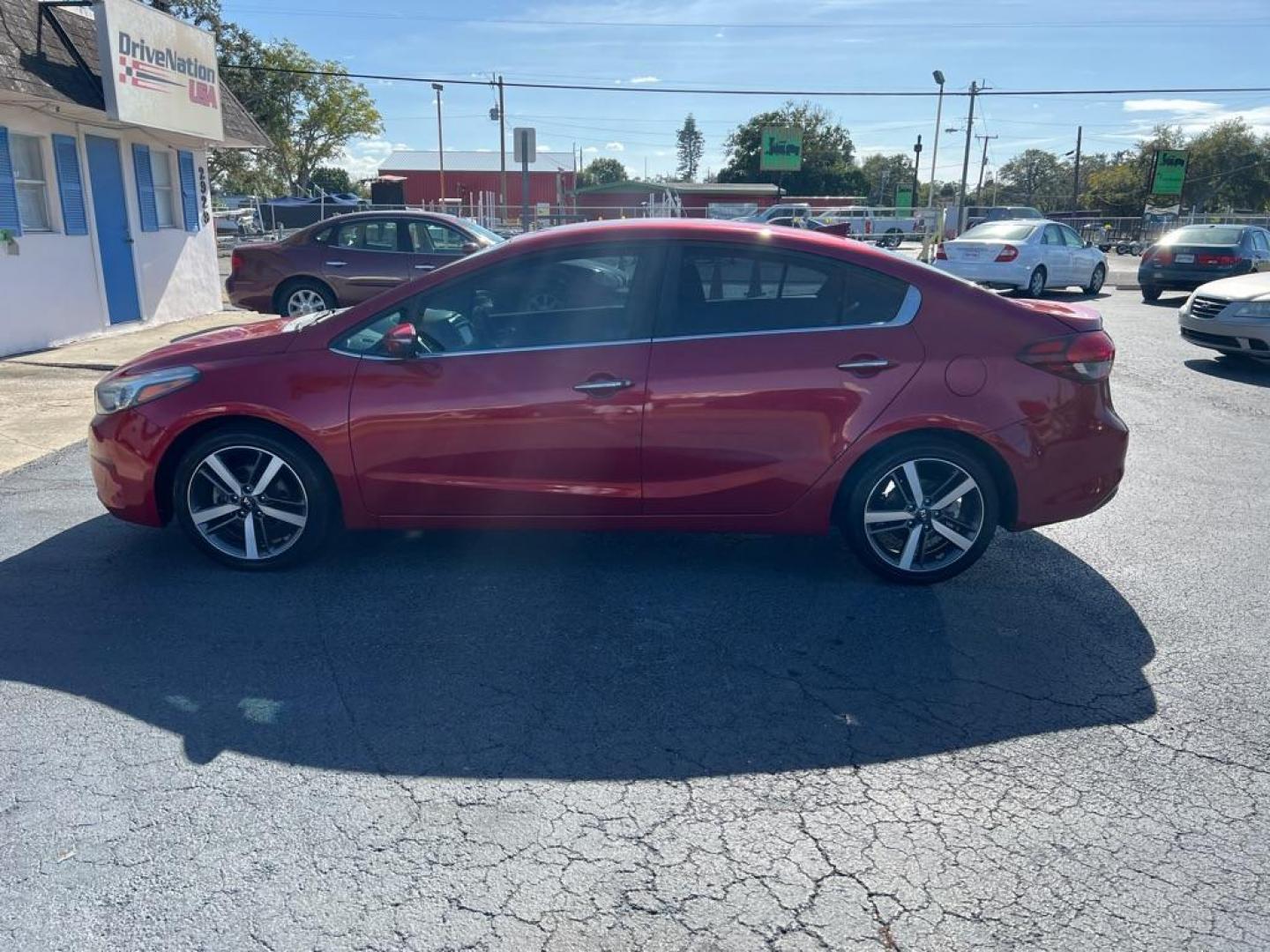 2018 RED KIA FORTE EX (3KPFL4A81JE) with an 2.0L engine, Automatic transmission, located at 2929 9th St. West, Bradenton, 34205, (941) 242-2810, 27.473591, -82.570679 - Thanks for inquring into DriveNation USA! All vehicles listed can be viewed at www.drivenationusa.com for vehicle history reports and additonal info. We cannot quote any terms such as down payments or monthly payments without an application. You can apply directly at www.drivenationusa.com or by con - Photo#5