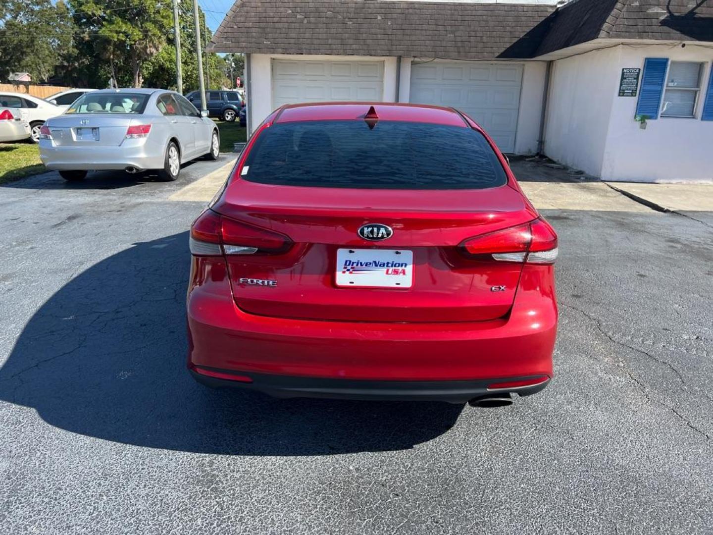 2018 RED KIA FORTE EX (3KPFL4A81JE) with an 2.0L engine, Automatic transmission, located at 2929 9th St. West, Bradenton, 34205, (941) 242-2810, 27.473591, -82.570679 - Thanks for inquring into DriveNation USA! All vehicles listed can be viewed at www.drivenationusa.com for vehicle history reports and additonal info. We cannot quote any terms such as down payments or monthly payments without an application. You can apply directly at www.drivenationusa.com or by con - Photo#7