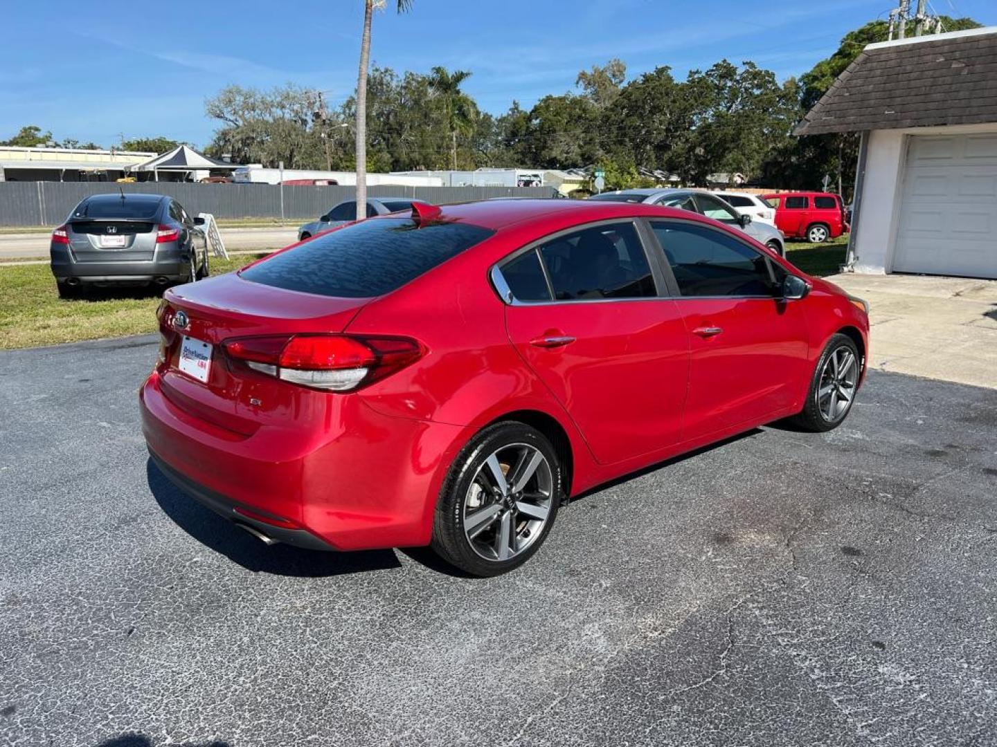 2018 RED KIA FORTE EX (3KPFL4A81JE) with an 2.0L engine, Automatic transmission, located at 2929 9th St. West, Bradenton, 34205, (941) 242-2810, 27.473591, -82.570679 - Thanks for inquring into DriveNation USA! All vehicles listed can be viewed at www.drivenationusa.com for vehicle history reports and additonal info. We cannot quote any terms such as down payments or monthly payments without an application. You can apply directly at www.drivenationusa.com or by con - Photo#8