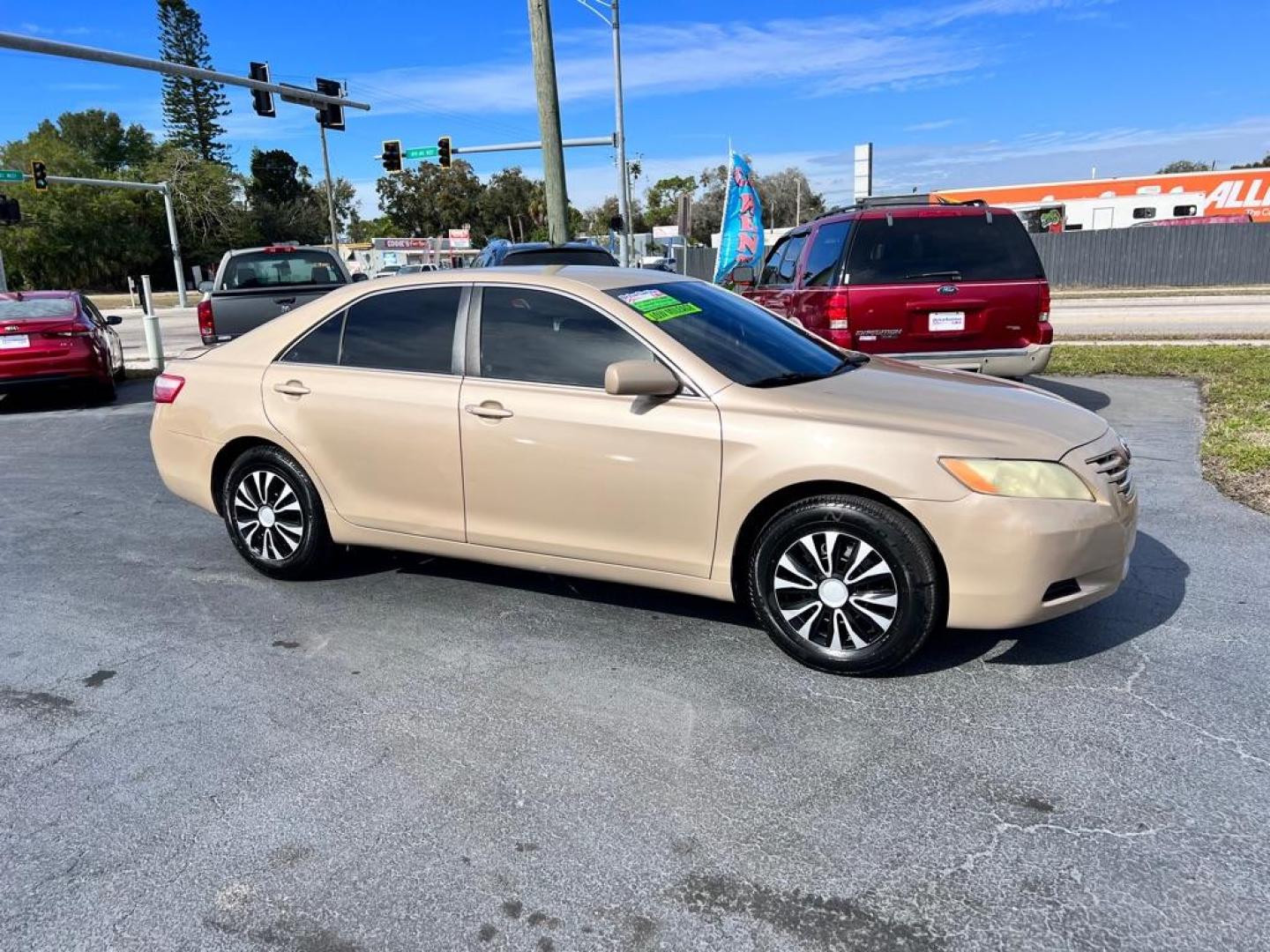 2009 TAN TOYOTA CAMRY SE (4T1BE46K69U) with an 2.4L engine, Automatic transmission, located at 2929 9th St. West, Bradenton, 34205, (941) 242-2810, 27.473591, -82.570679 - Photo#0