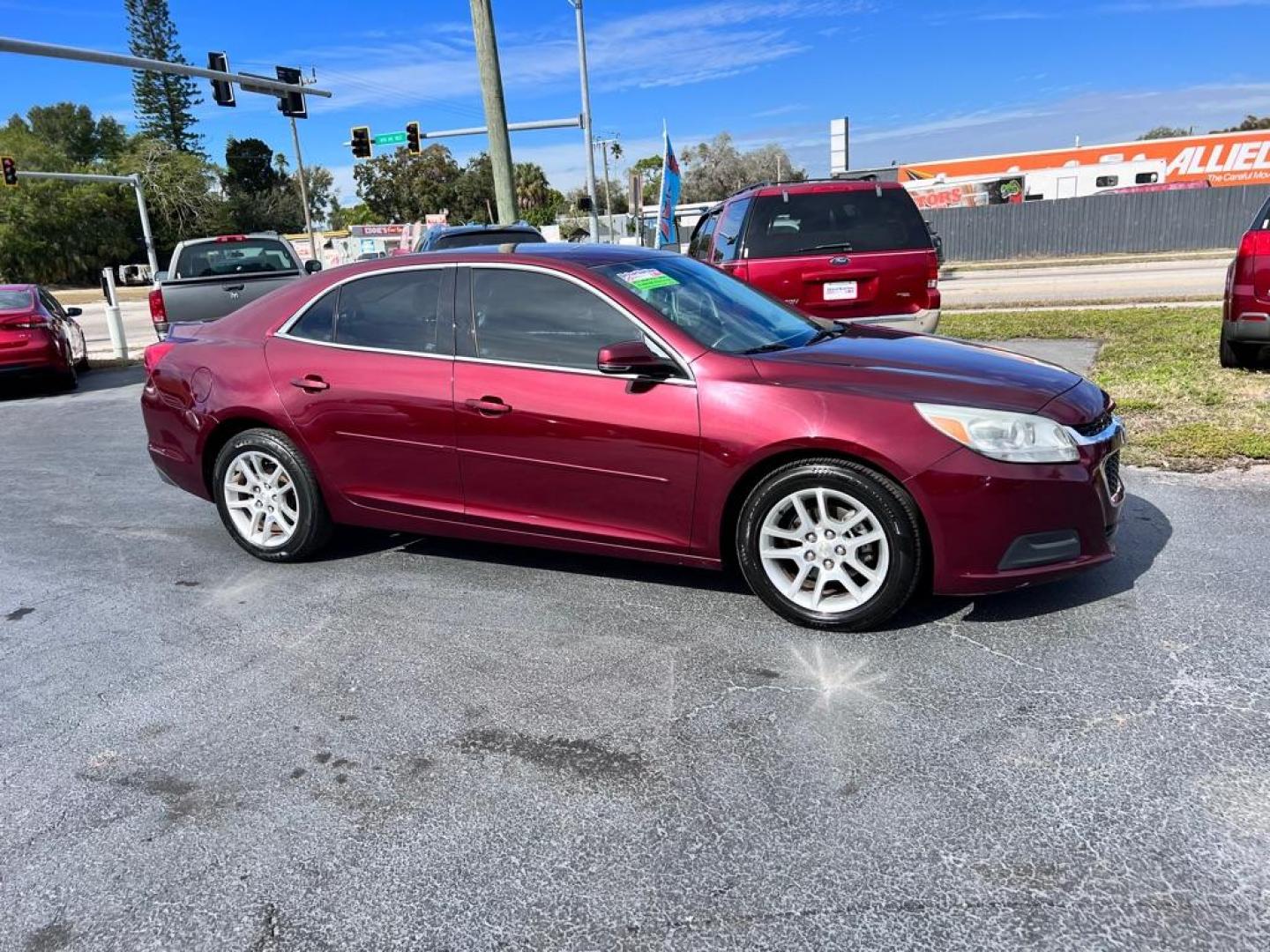 2014 MAROON CHEVROLET MALIBU 1LT (1G11C5SL2EF) with an 2.5L engine, Automatic transmission, located at 2929 9th St. West, Bradenton, 34205, (941) 242-2810, 27.473591, -82.570679 - Photo#0