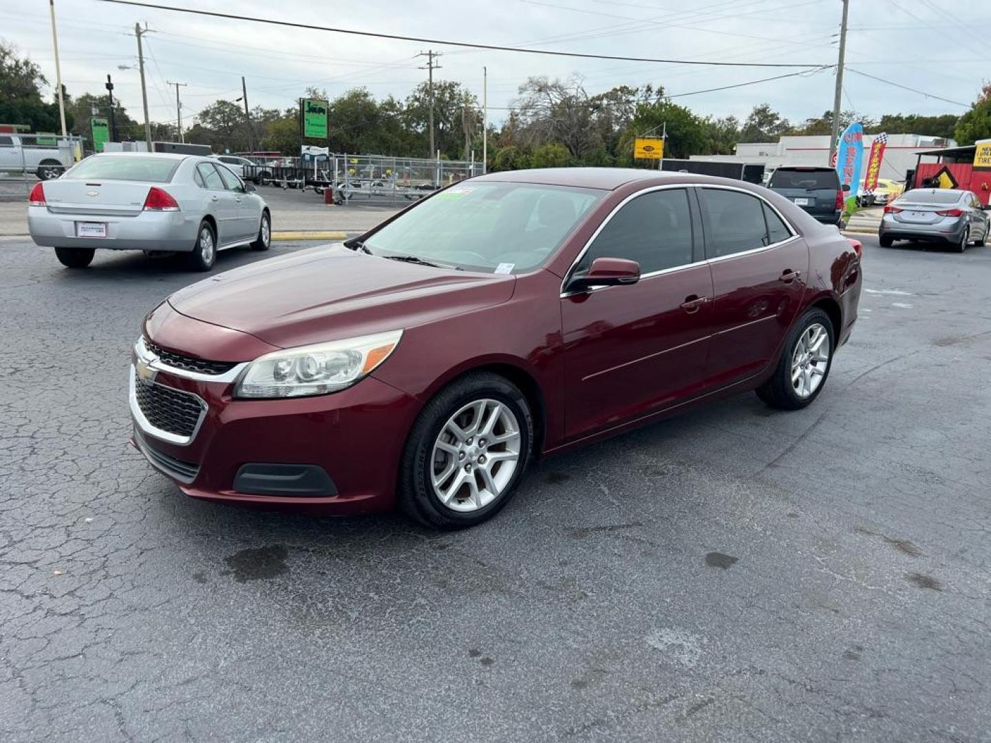 2014 MAROON CHEVROLET MALIBU 1LT (1G11C5SL2EF) with an 2.5L engine, Automatic transmission, located at 2929 9th St. West, Bradenton, 34205, (941) 242-2810, 27.473591, -82.570679 - Photo#2