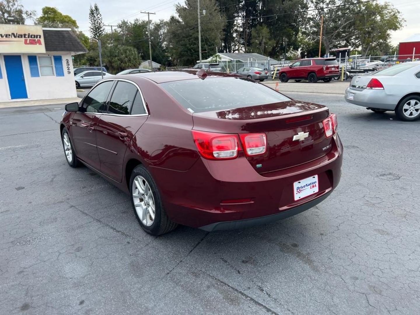 2014 MAROON CHEVROLET MALIBU 1LT (1G11C5SL2EF) with an 2.5L engine, Automatic transmission, located at 2929 9th St. West, Bradenton, 34205, (941) 242-2810, 27.473591, -82.570679 - Photo#4