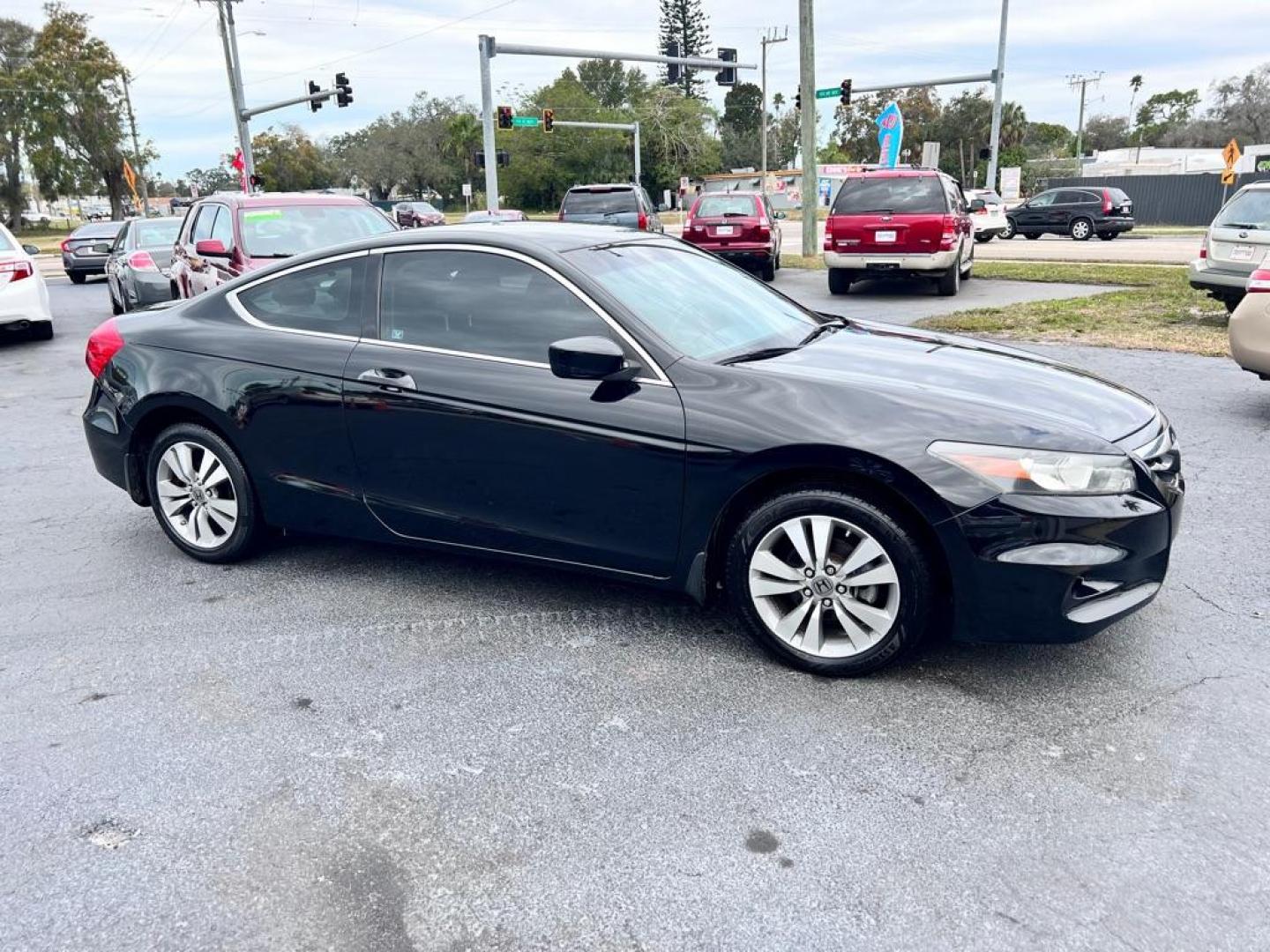 2012 BLACK HONDA ACCORD LX (1HGCS1B30CA) with an 2.4L engine, Automatic transmission, located at 2929 9th St. West, Bradenton, 34205, (941) 242-2810, 27.473591, -82.570679 - Photo#2