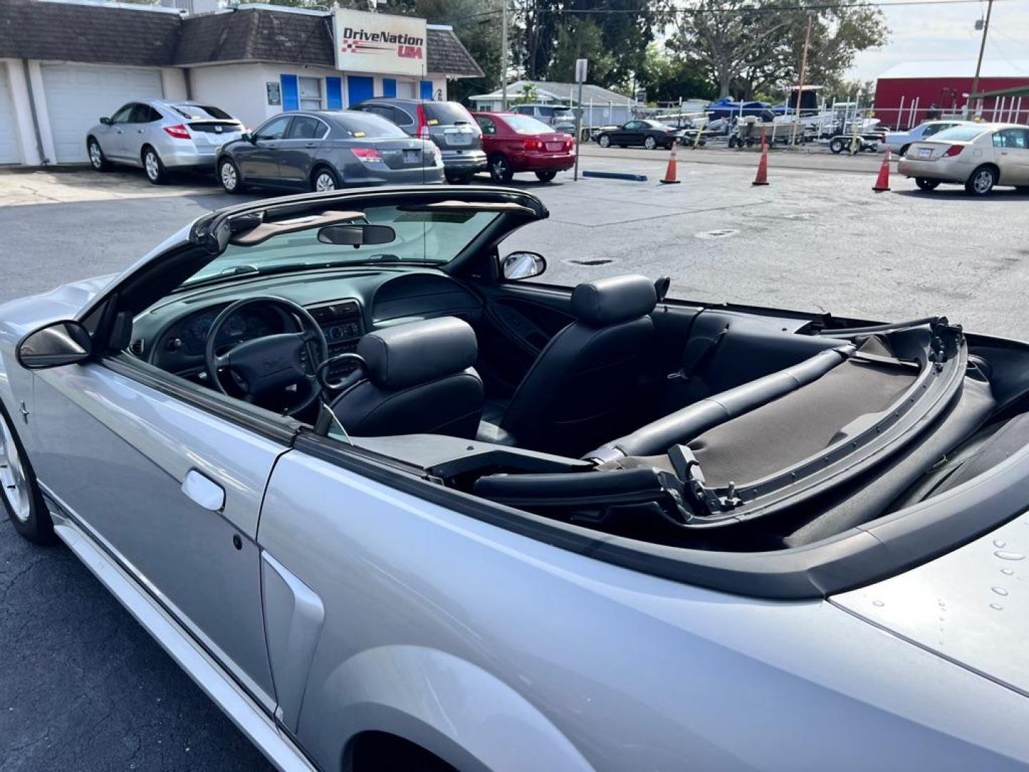 2001 SILVER FORD MUSTANG (1FAFP44471F) with an 3.8L engine, Automatic transmission, located at 2929 9th St. West, Bradenton, 34205, (941) 242-2810, 27.473591, -82.570679 - Thanks for inquring into DriveNation USA! All vehicles listed can be viewed at www.drivenationusa.com for vehicle history reports and additonal info. We cannot quote any terms such as down payments or monthly payments without an application. You can apply directly at www.drivenationusa.com or by con - Photo#12