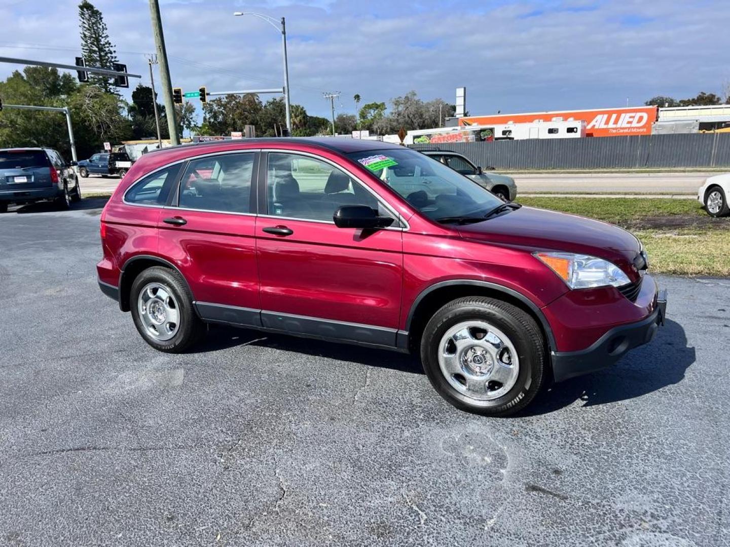 2009 MAROON HONDA CR-V LX (JHLRE38319C) with an 2.4L engine, Automatic transmission, located at 2929 9th St. West, Bradenton, 34205, (941) 242-2810, 27.473591, -82.570679 - Photo#0