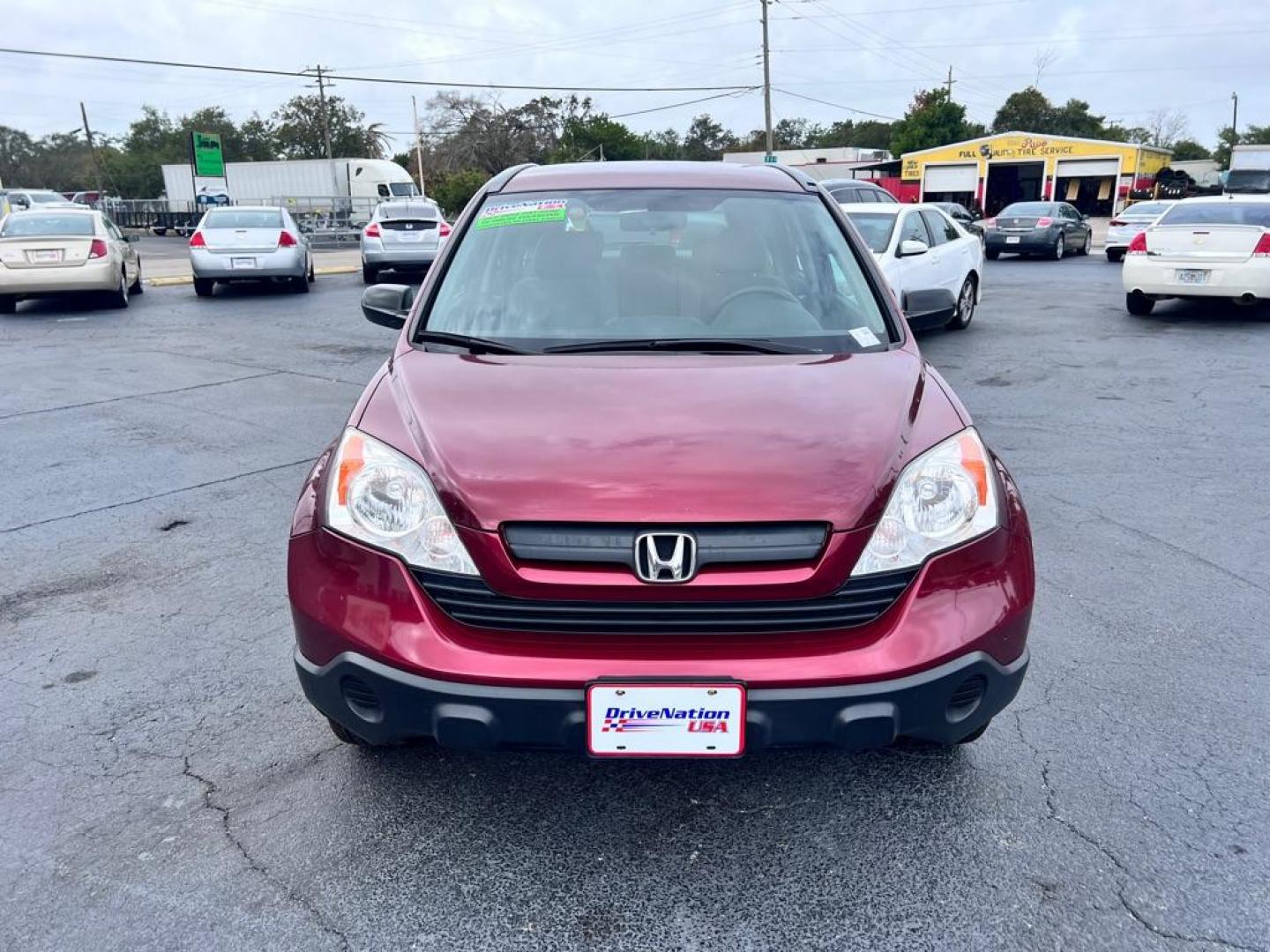 2009 MAROON HONDA CR-V LX (JHLRE38319C) with an 2.4L engine, Automatic transmission, located at 2929 9th St. West, Bradenton, 34205, (941) 242-2810, 27.473591, -82.570679 - Photo#3